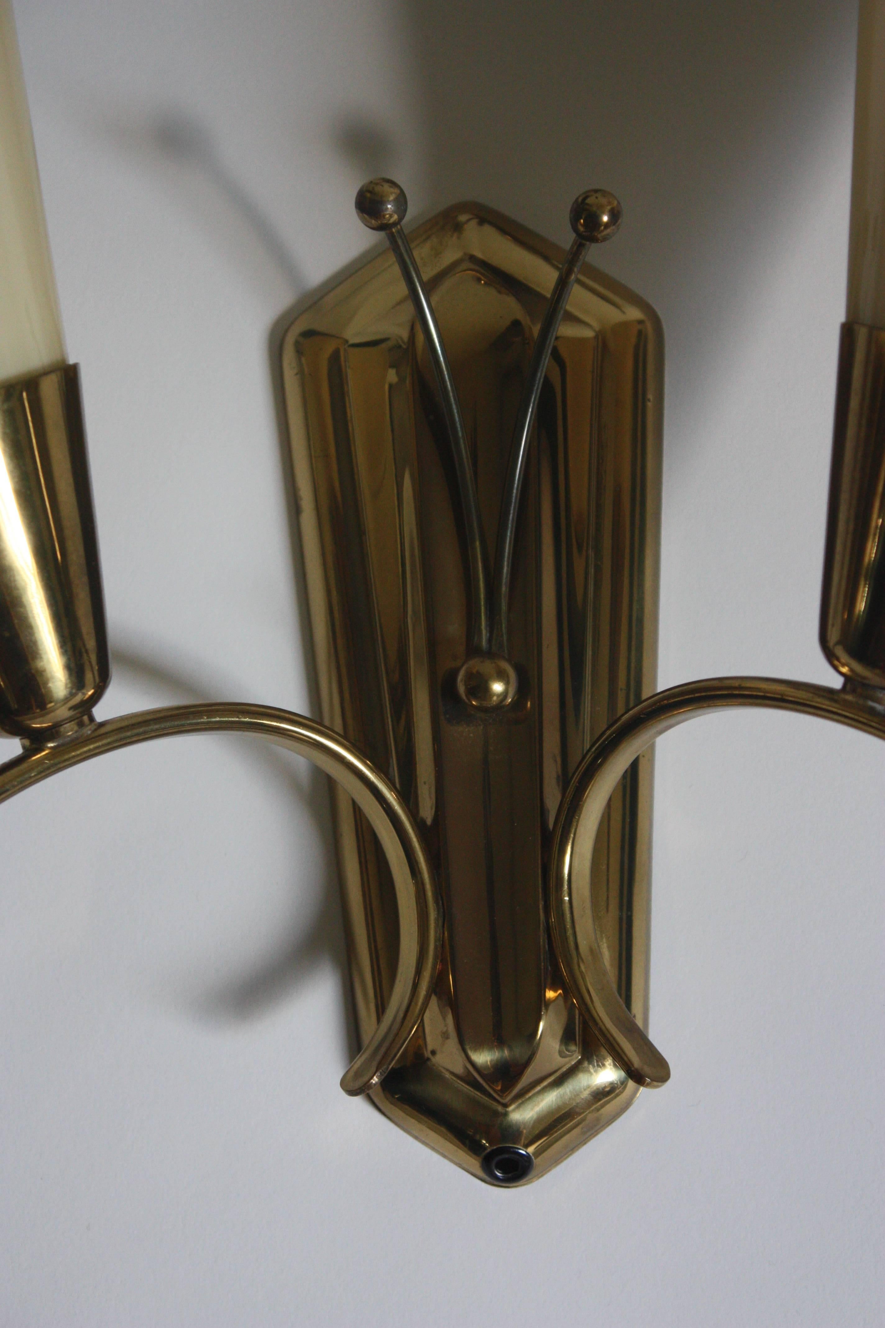 Beautiful pair of wall sconces with opal glass and brass frame in the style of Paavo Tynell, 1950s.
Socket: each two x e14
New rewired.