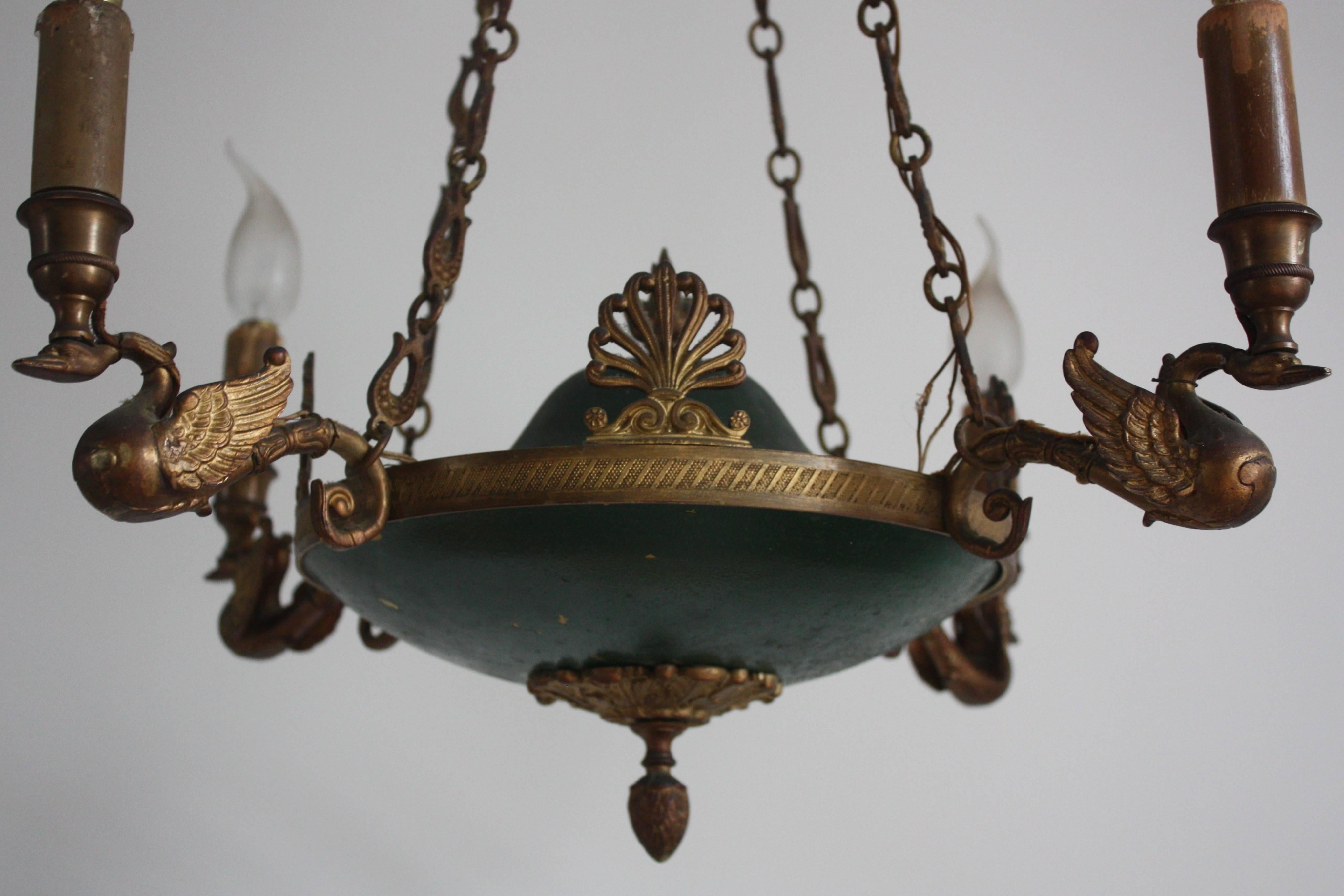 Bronze four-light chandelier in the style of Empire.
France, circa 1870s.
Socket: 4 x e14 for standard screw bulbs.
Good original condition.
 