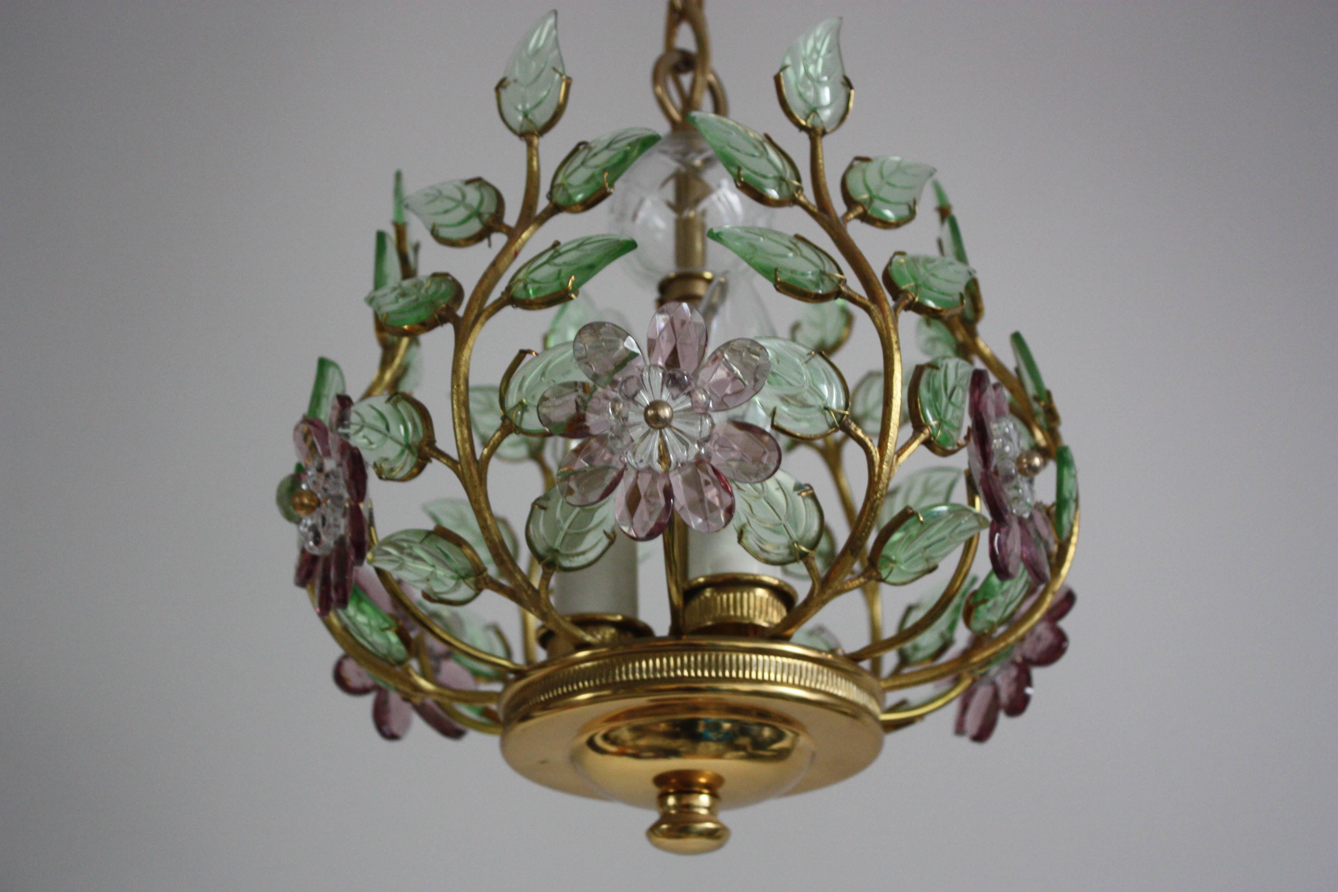 Lovely and absolutely rare three-light flower chandelier by Maison Bagues, France, circa 1950s.
Beautiful colorful violet, green iridescent cut-glass/crystal and gilt brass.
Socket: Three E14 Edison for standard screw bulbs.
Excellent condition.