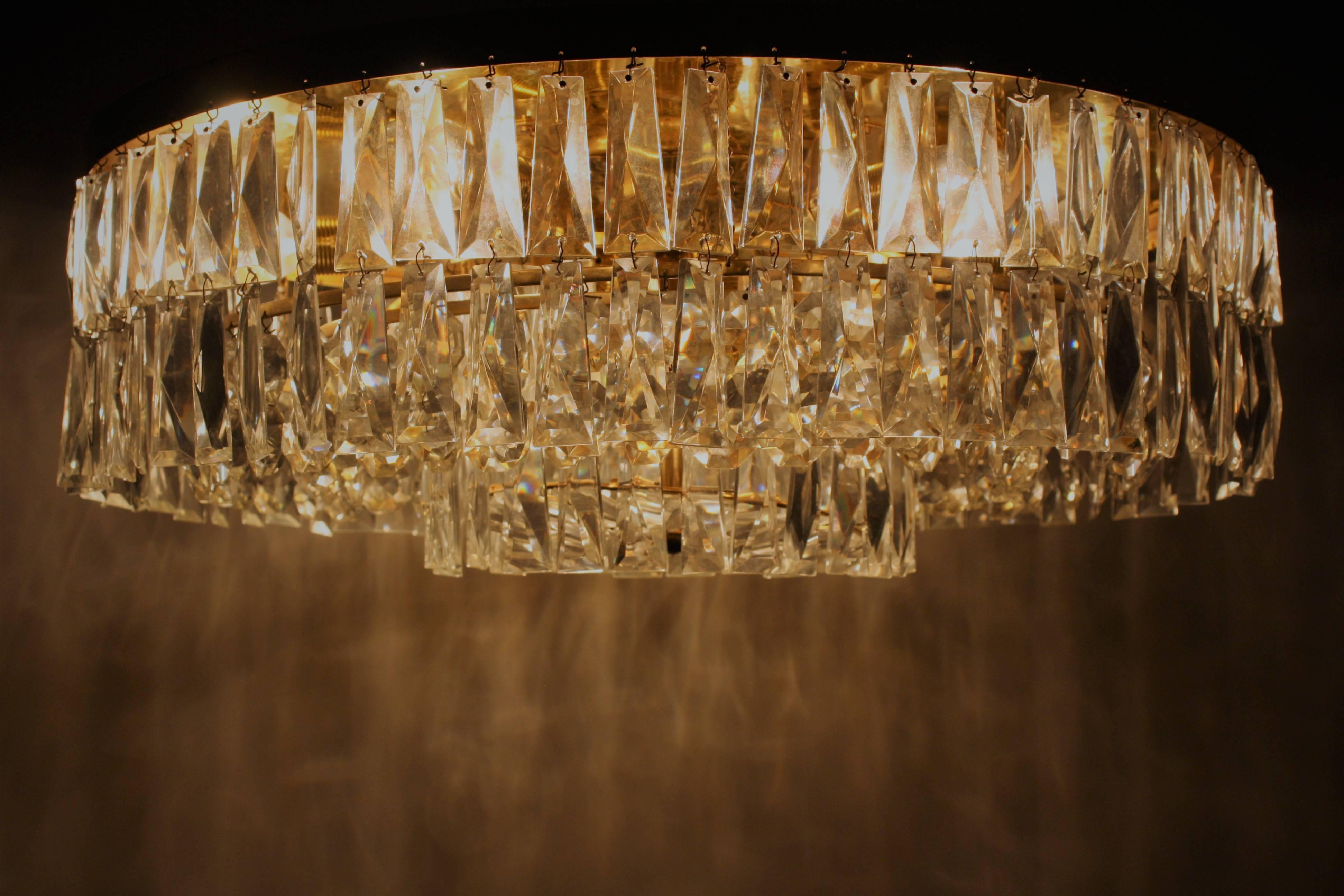 Gilt brass and cut-glass nine-light flush mount by Palwa, Germany, circa 1960s.
Germany, 1960s, very good condition.
Socket: Nine e14 (Edison) for standard screw bulbs.
Excellent condition.