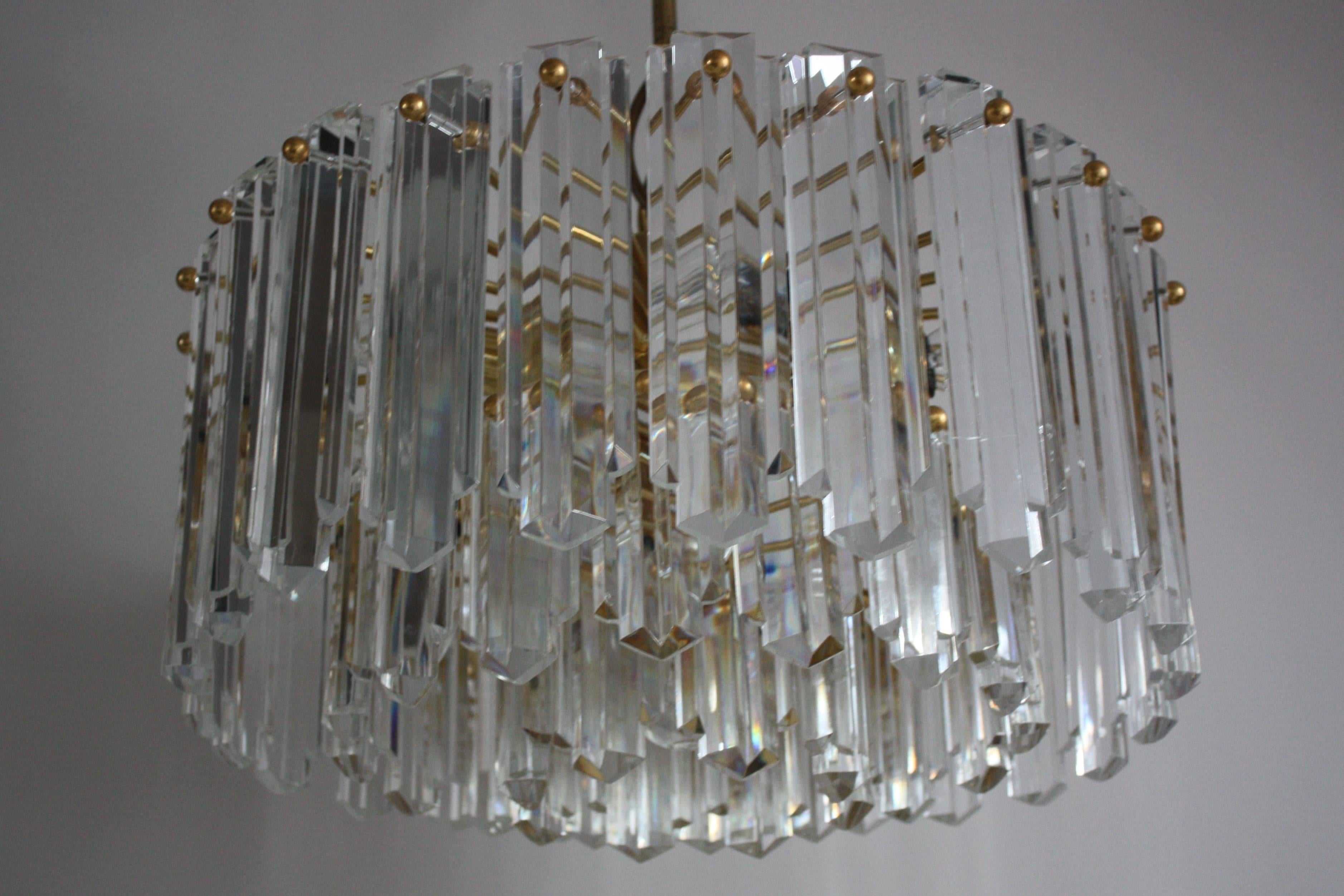 Large and very rare model of midcentury chandelier by Kalmar, Austria, Vienna, circa 1960s.
Twelve-light gilt brass frame suspended with 44 thick cut - crystal elements.
Socket: 13 x e14 and one x e27 Edison base for standard screw