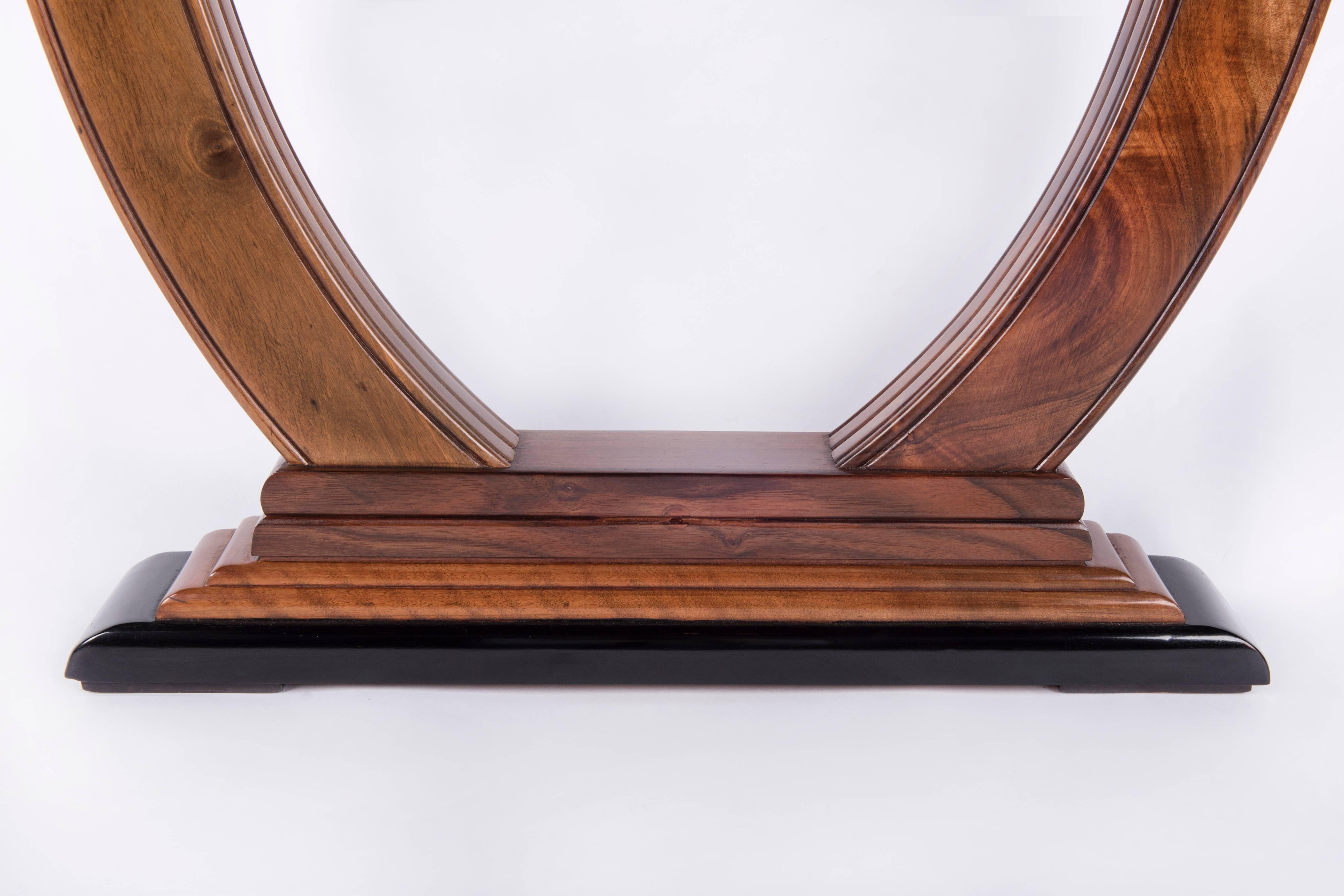Ebony Macassar and walnut art-deco console table.
The console table was  restored and repolished with a handmade lustrous French polish.
1930, French origin.