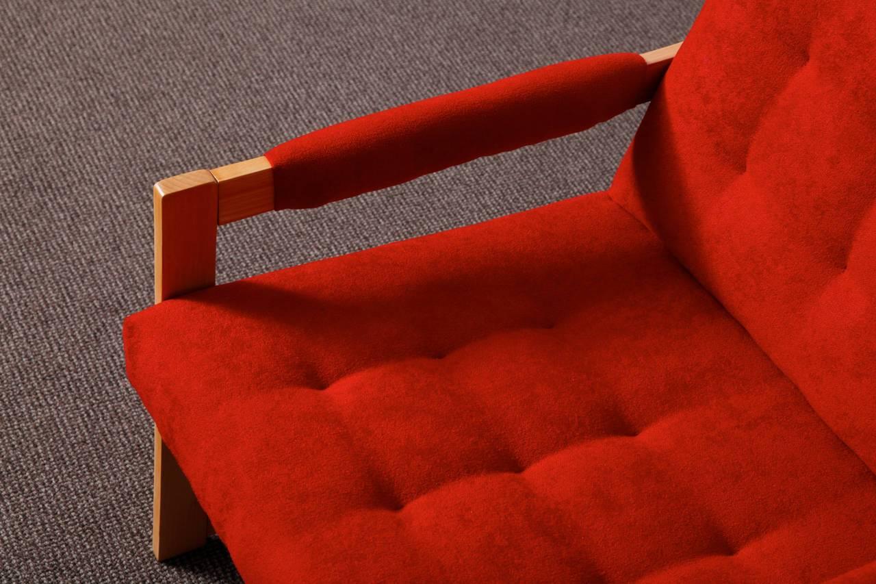 Ashwood pair of armchairs reupholstered with a red colored cotton.
The chairs were designed in the spirit of modernism. This simple and modest design makes them very elegant.
They suit very well in a living room or in a bed room. They match