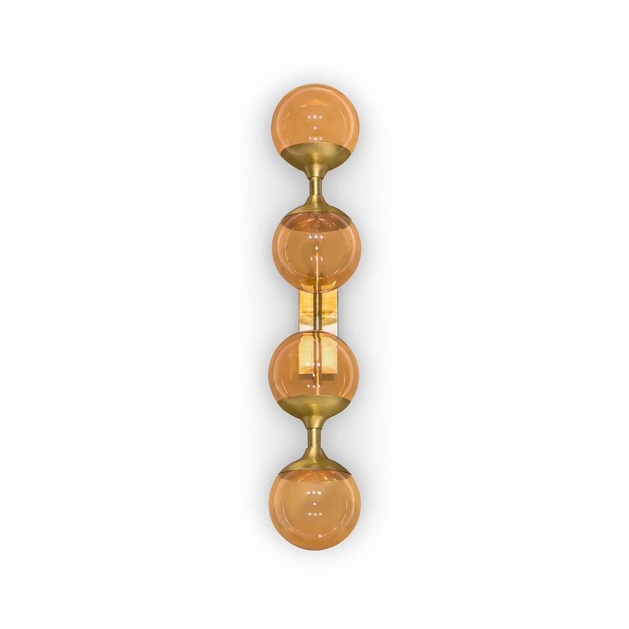 A modern Mid-Century styled handmade European wall sconce with a simple yet chic styling, excellent for both personal and hospitality applications. handblown brushed bronze glass. 4 x G9 bulbs for UK/EU / G9 USA. 40 watts. 6 kilos/13.22 lbs.