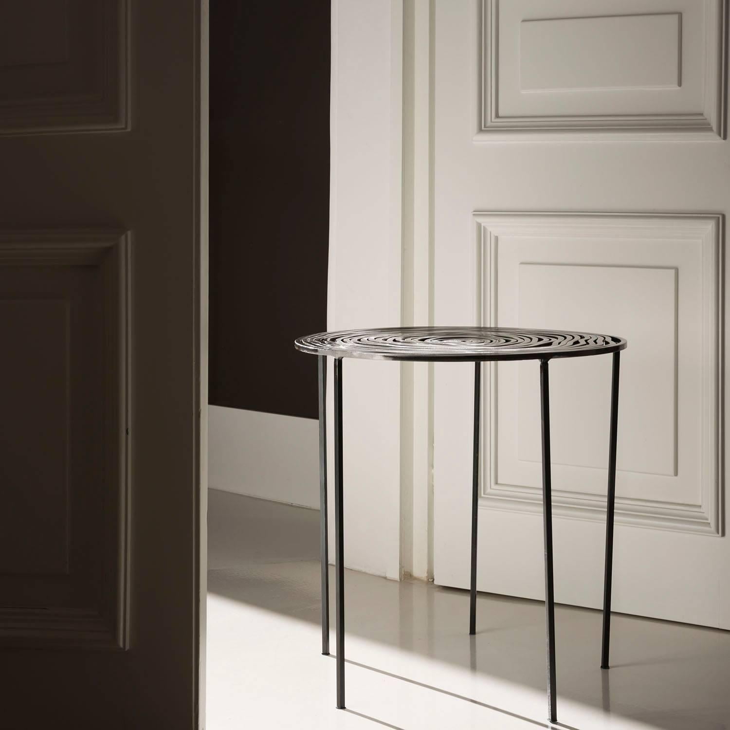 Eclipse line by Piazzadispagna9 design studio presented in 2017 Maison & Objet in Paris. Side table in iron handmade in Italy.