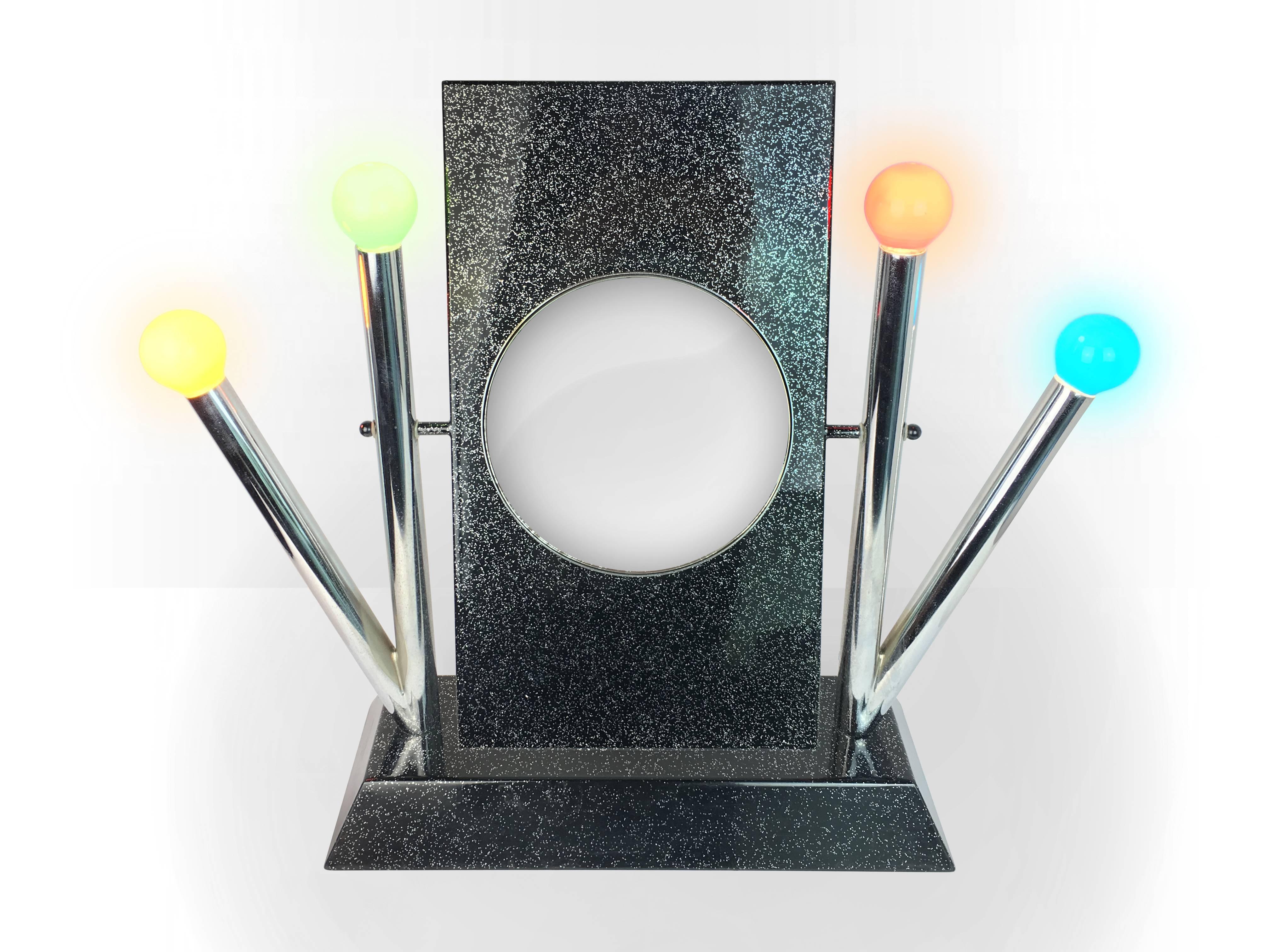 Double side rotatable Yucca table mirror with colourful lights designed by Anna Anselmi and manufactured by Bieffeplast. Lights can be exchanged with lamps of any color.