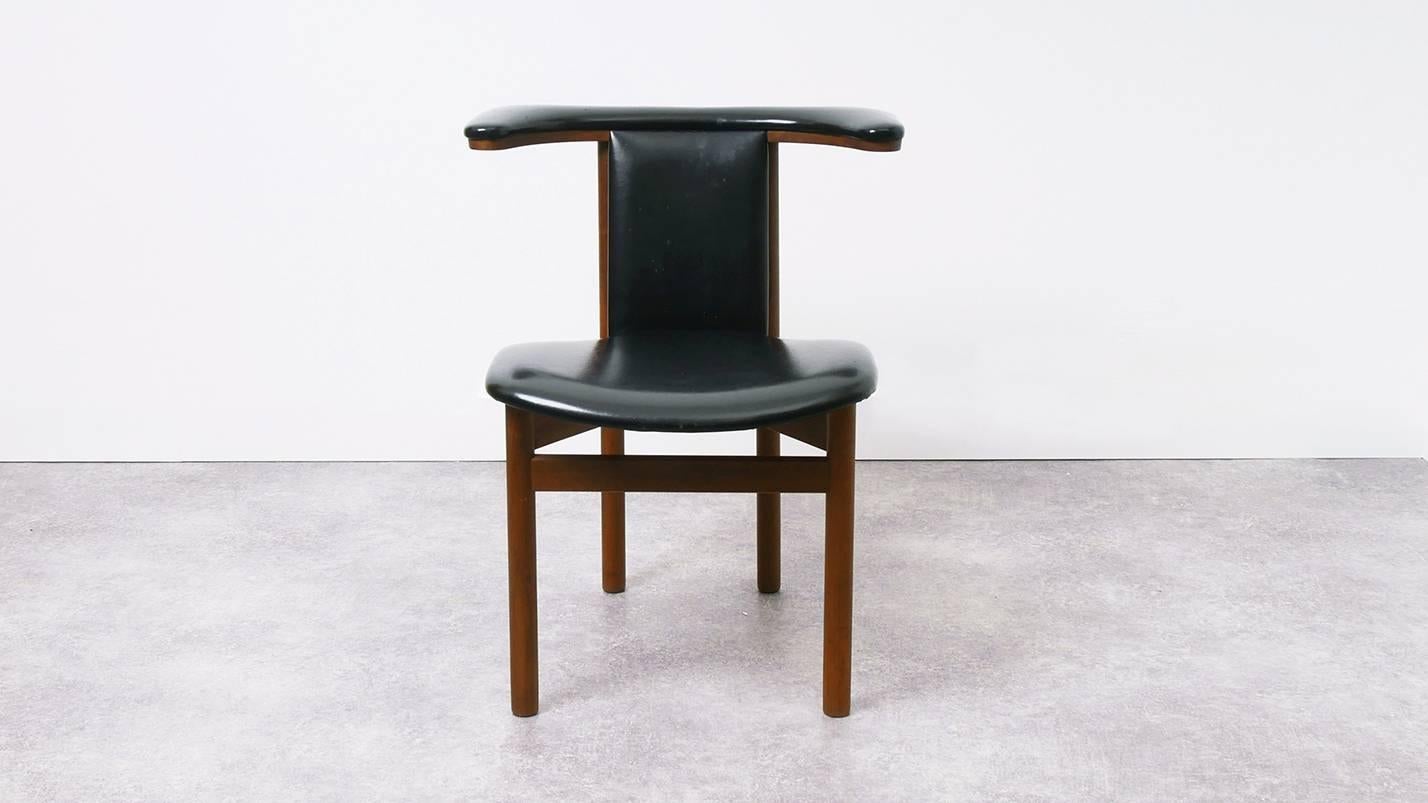 Hans Olsen, Frederik VII chair of teak wood, with seat, back and elbow support covered with black skai. Performed at Snedkermester MJ Rasmussen, Ærøskøbing. The chair was rewarded in 1964 with the American AID award. "20th Annual International