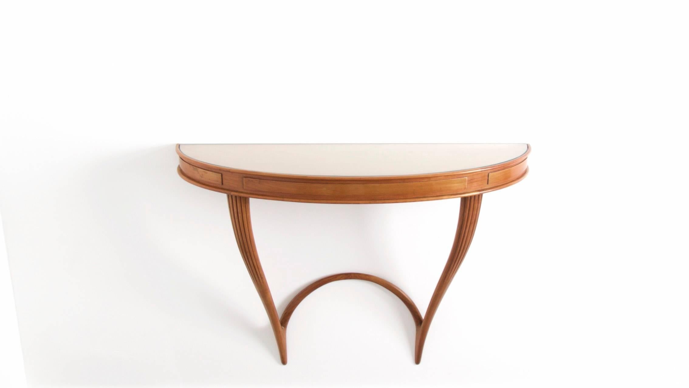 Very elegant Carlo Enrico Rava wall-mounted console in cheery wood with a smoked glass on top. The structure is carved with stripes. Two pieces are available from the same model. This one is 100 cm large. The other is 130 cm large. They can be