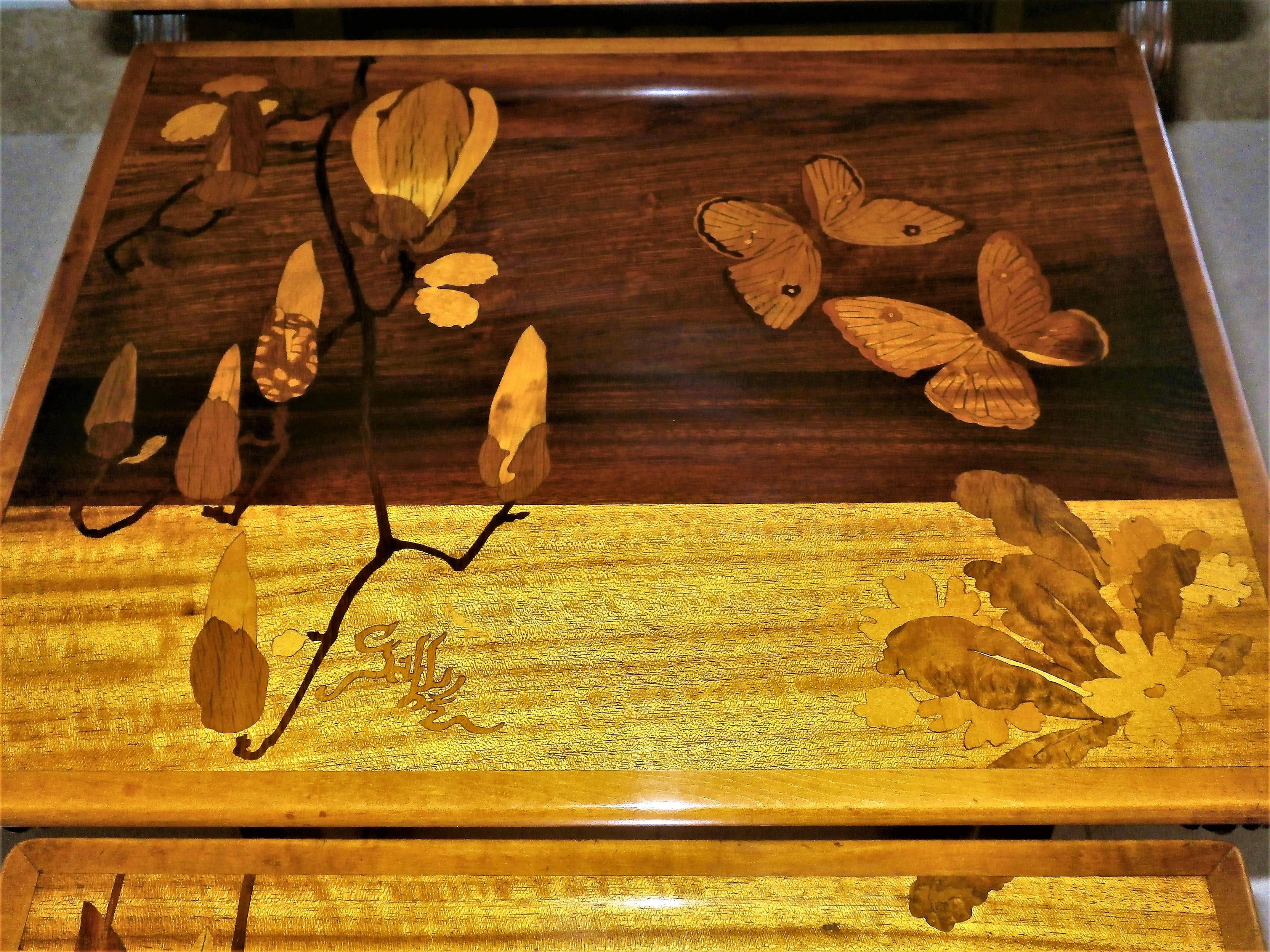 Incredibly beautiful set of four nesting tables each one signed by Gallé in a Japanese way. In solid teinted beech wood.
Gorgeous marquetry floral decoration and butterflies, etc., each table is one of a kind. Beautiful side decoration.
France,
