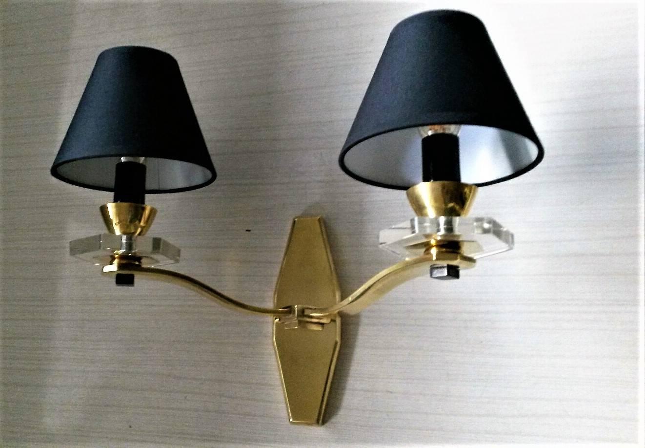 Gorgeous Mid century modern pair of two-arm French sconces made in gilt bronze and ornamentations in glass and black patina. 

It is stamped D. and numbered. 
In a very good general original condition, beautiful patina.
The electric part has been