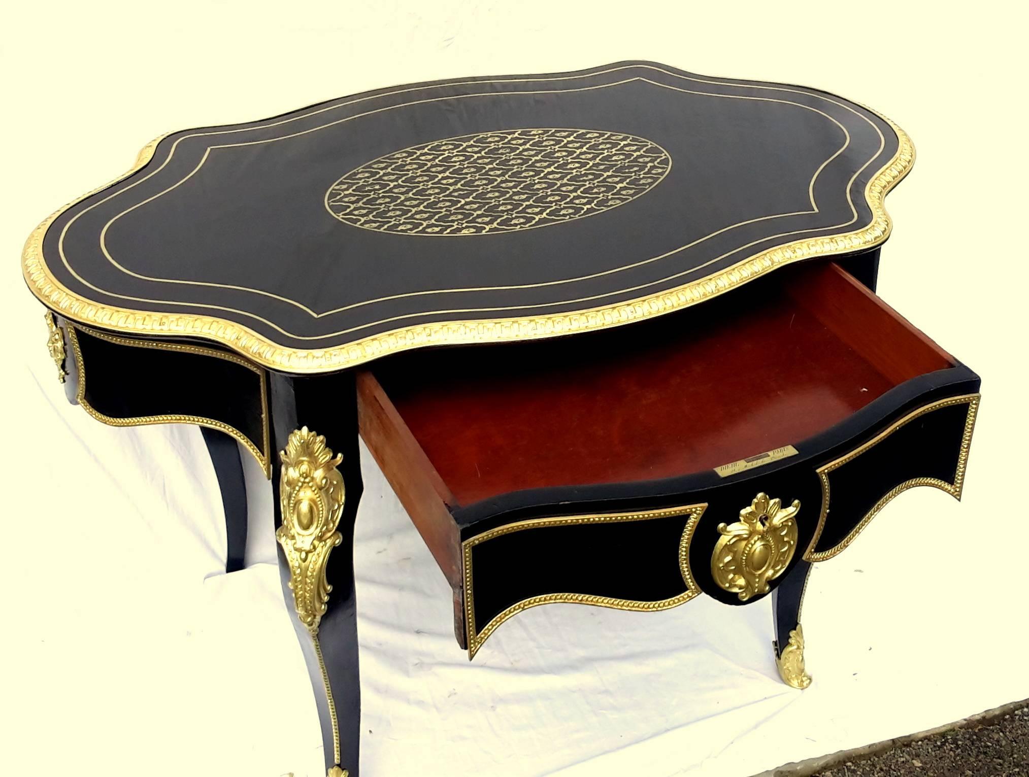 Gorgeous Louis XV style, fiddle desk writing dining table, France, circa 1870
In the period of Napoleon III.
Signed by Diehl, in an excellent general condition.
Totally restored by specialists.
Made in veneered ebony and Boulle style marquetry