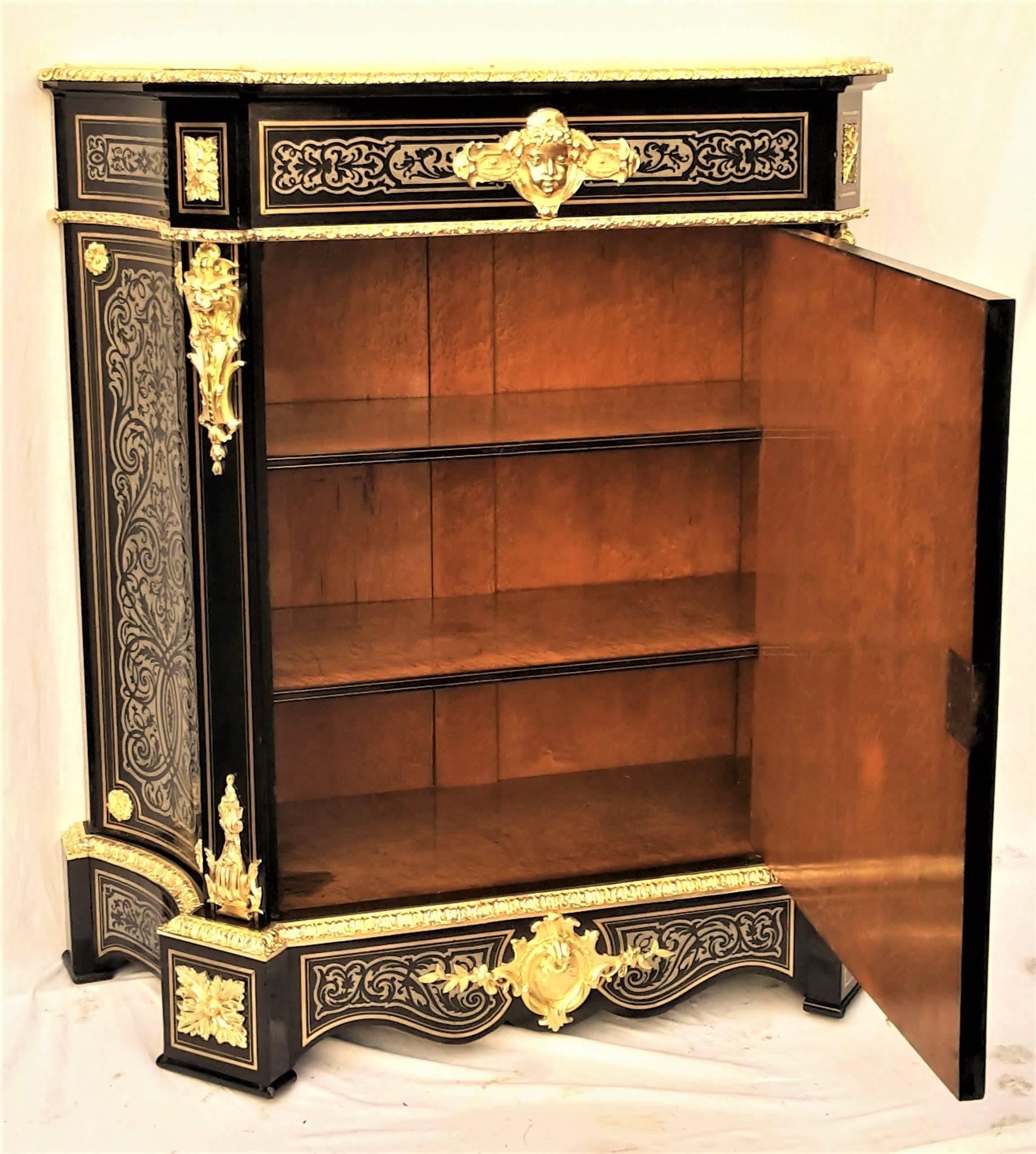 Large magnificent French cabinet, unique, rare tin marquetry in Boulle style at every facade and even at the base. Gorgeous and elegant ornaments in gilt bronze and inlaid Carrara marble in a good condition. The central motif of the door medallion