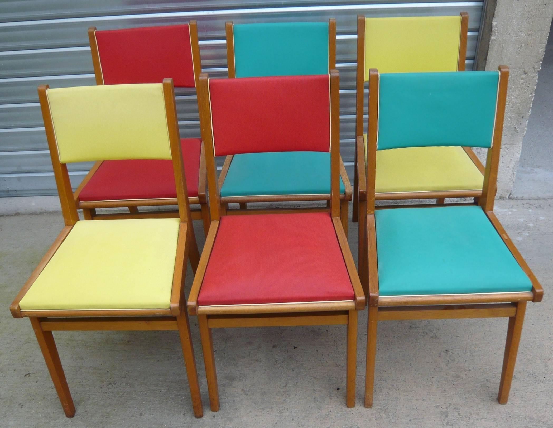 Original French Mid-Century set of six chairs, in three different great vintage colors.(vintage yellow, red and blue)
They are all stabile, solid, chairs made in massif beech wood, honey color, light weight. 

They have been all restored and