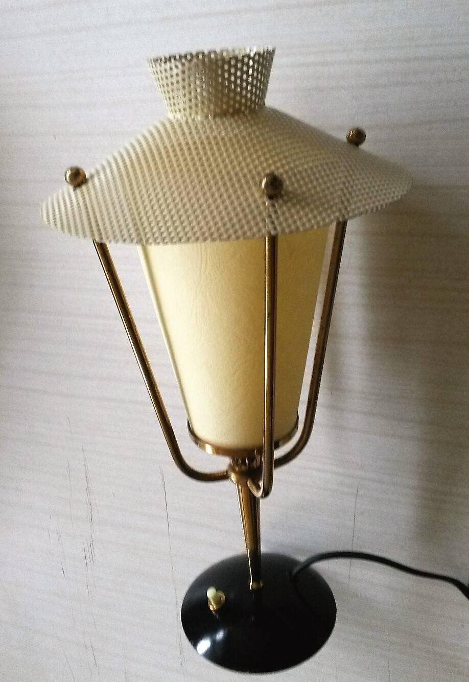 Pair of French table or night lamps by  Maison Arlus, in brass and perforated sheet metal in a great Ivory color and rhodoid lampshades.
France, circa 1950.

Brand new checked and wired, max 40 watts max each.
Dimensions:
Height 34 cm
width 18 cm