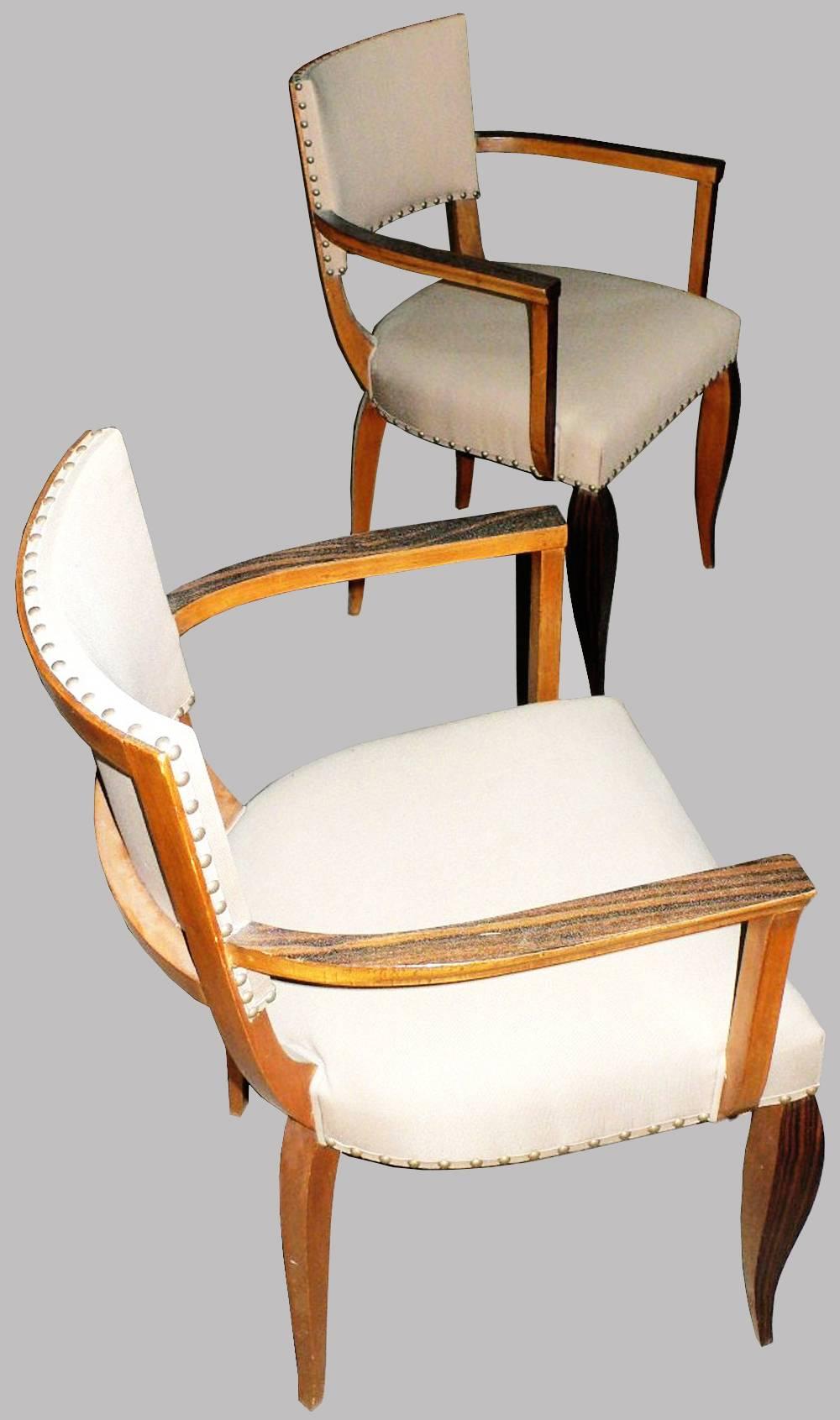 Pair of original French Bridge style Art Deco Office, living, dining room or bedroom elegant armchairs, attributed to Henri Bonjour.
Veneered ebony of Macassar wood with cream top and seating fabrics and beautiful legs, all in a very good