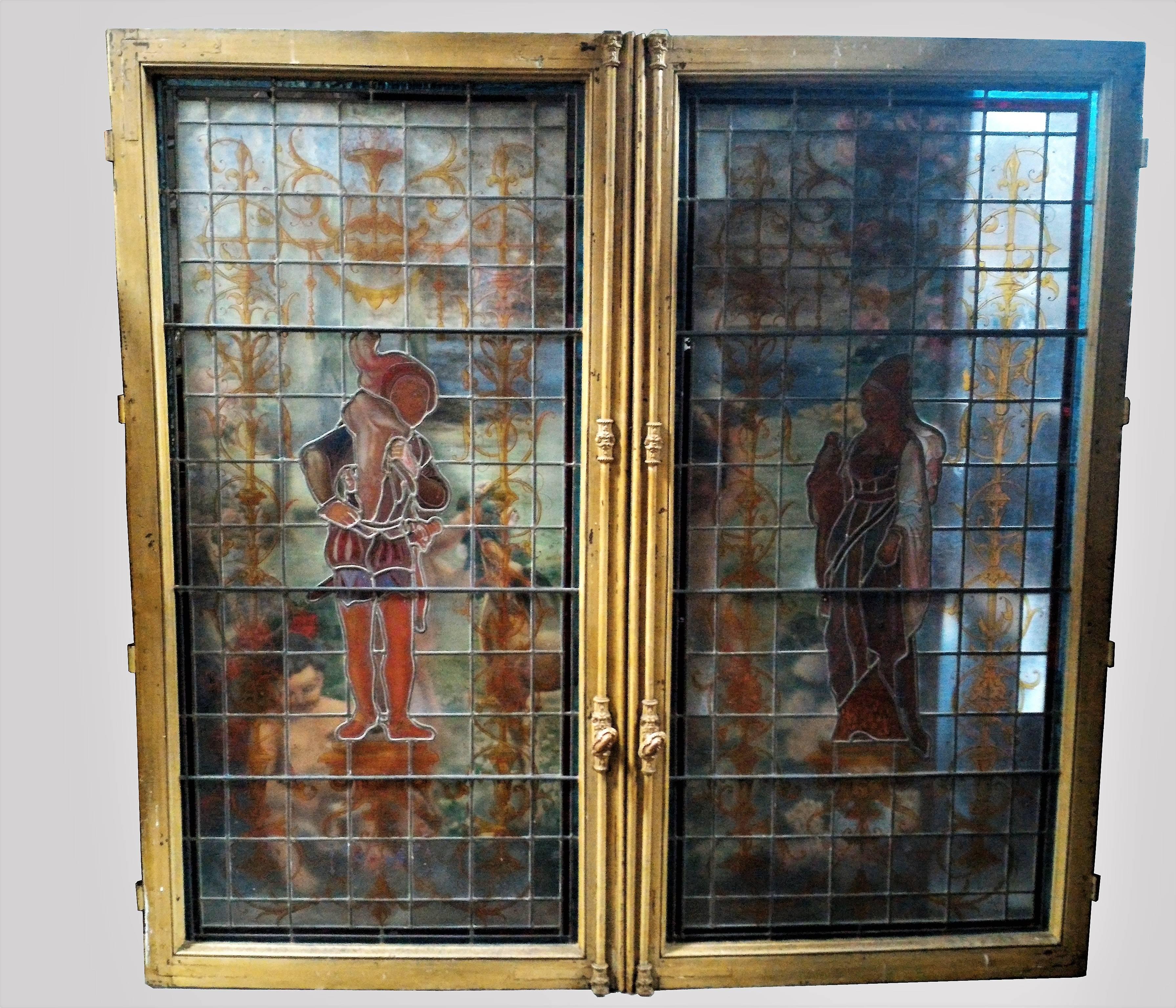 Gorgeous Parisian Renaissance Revival stained glass double window with fantastic colors, ornements and Renaissance characters.
Paris, 19th century, circa 1880.

Original window Framed in their elegant Parisian style handles. In a very good