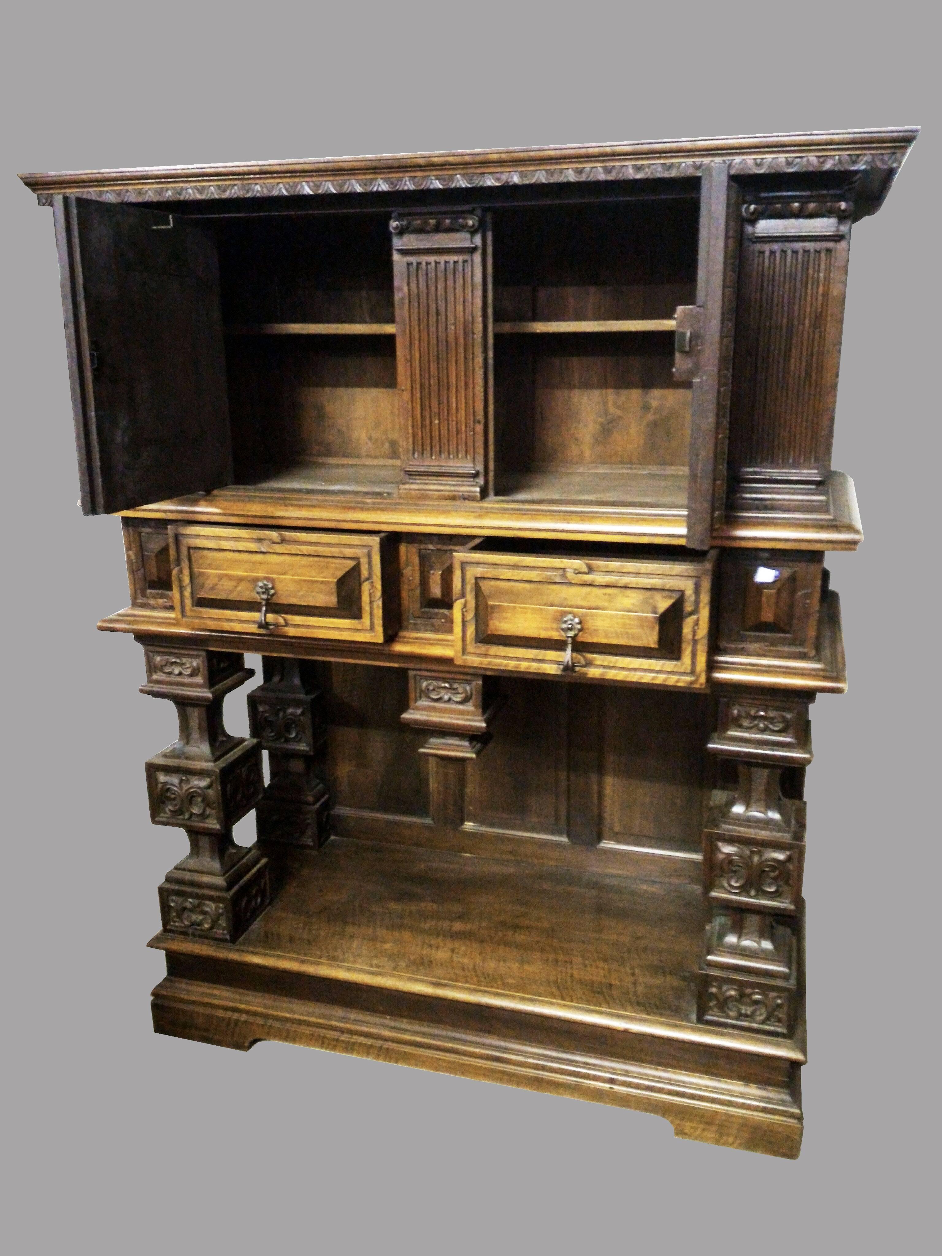 Impressive cabinet dressoir Buffet in neo Renaissance style, France circa 1880.Made in slid walnut wood.
Two doors and two drawers opens on its façade.
All hand-carved in a elegant way.

 