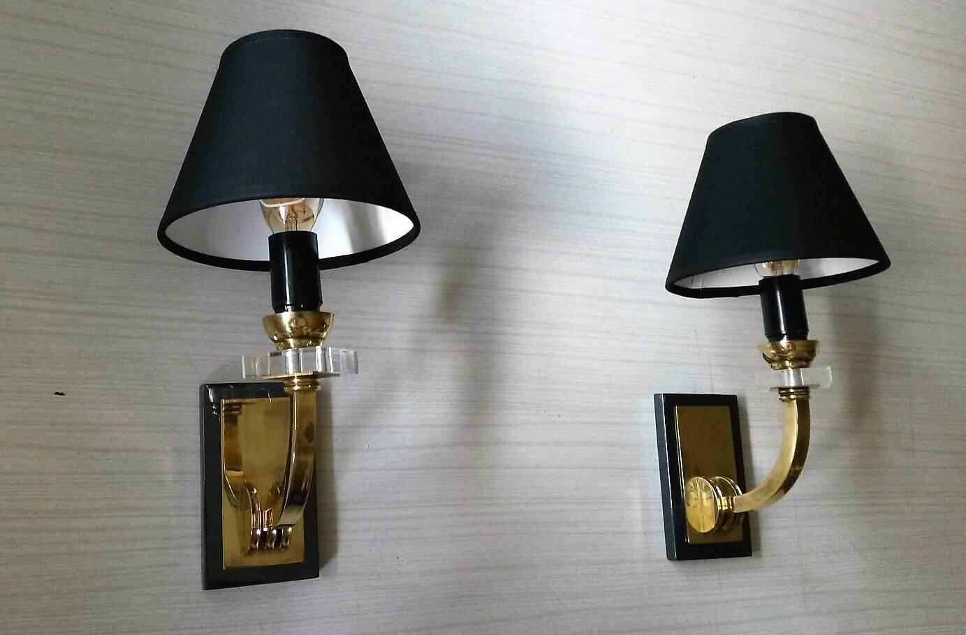 Gilt Elegant Pair of French Neoclassical Sconces by Jacques Adnet