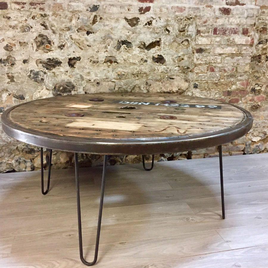 Charming French Industrial table made with an original vintage wood Touret and a metal frame.
We propose you to choose this table in two different heights as a low center table (35 cm height) or higher as a working or dinner table for 4 with a
