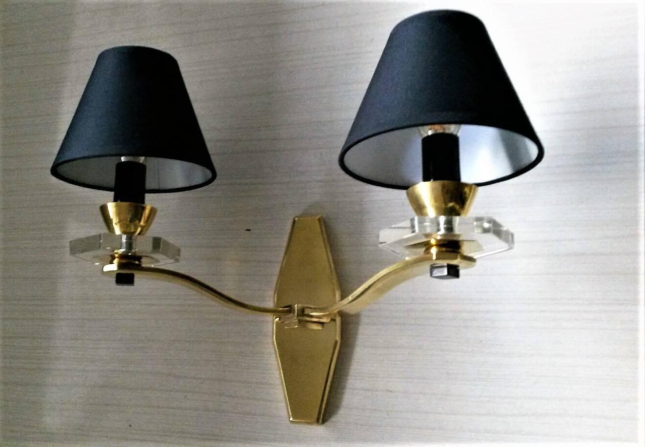 Gorgeous pair of two-arm French sconces made in gilt bronze and ornamentations in glass and black patina. 

It is stamped D. and numbered. 
In a very good general original condition, beautiful patina.
The electric part has been renewed and