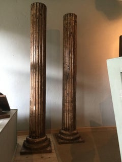 Pair of Patinated Wooden Columns