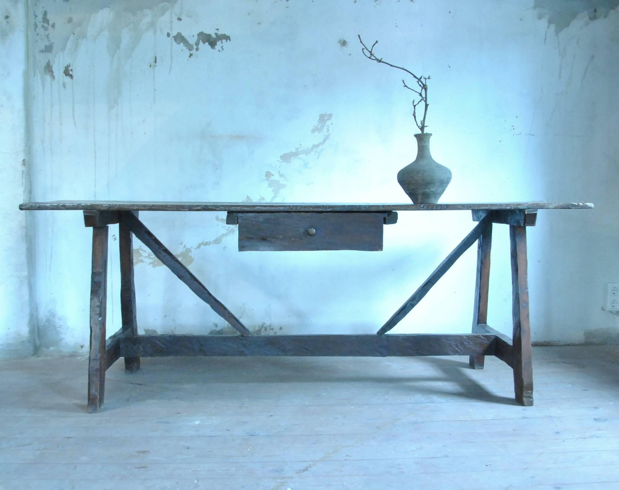 A beautiful simple Italian desk or dining table with a perfect, almost archaeological patina. Found in Lombardy. Very Wabi-sabi.