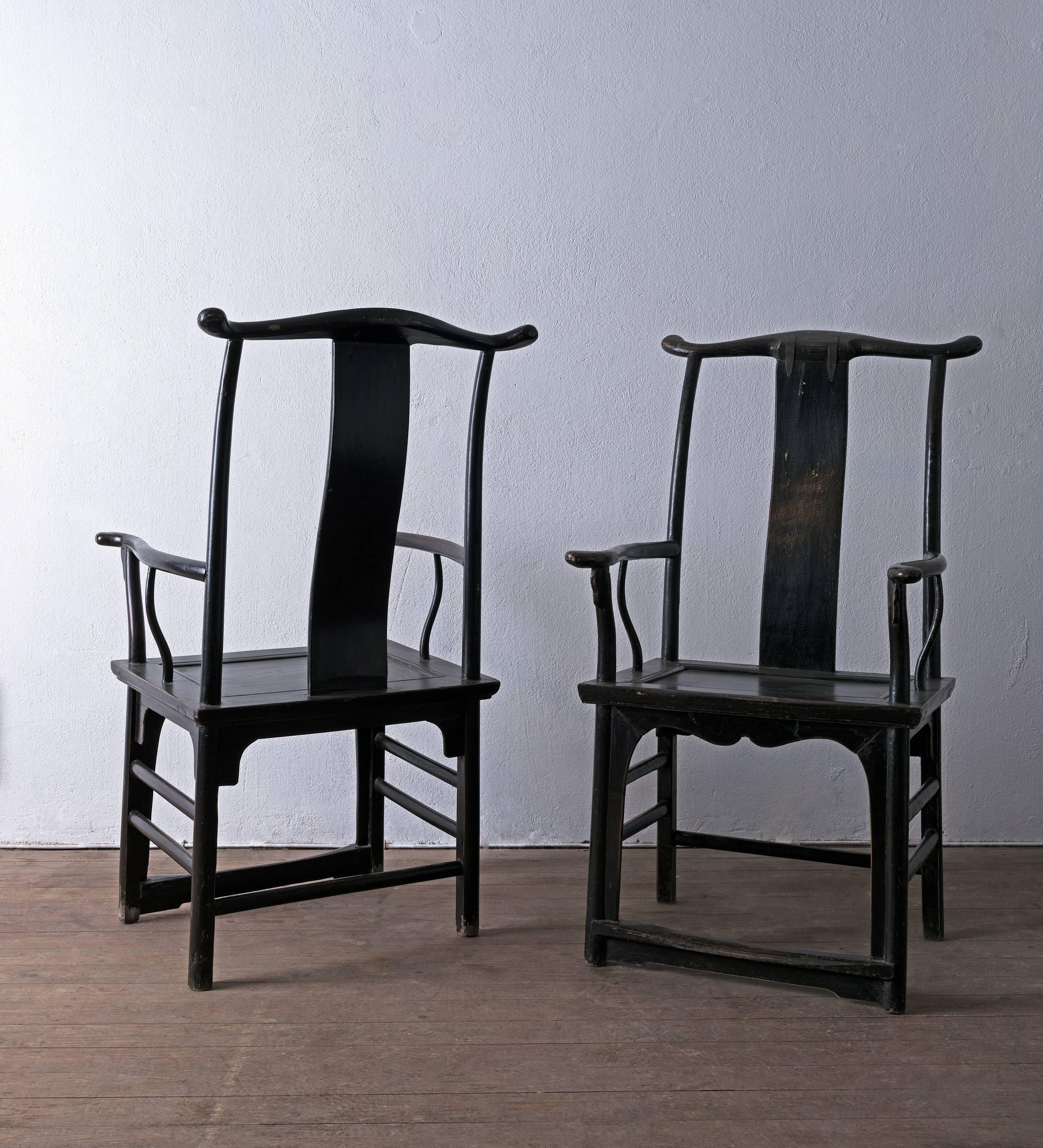 Very sculptural black painted chinese armchairs. Great visual impact and the perfect accent pieces.