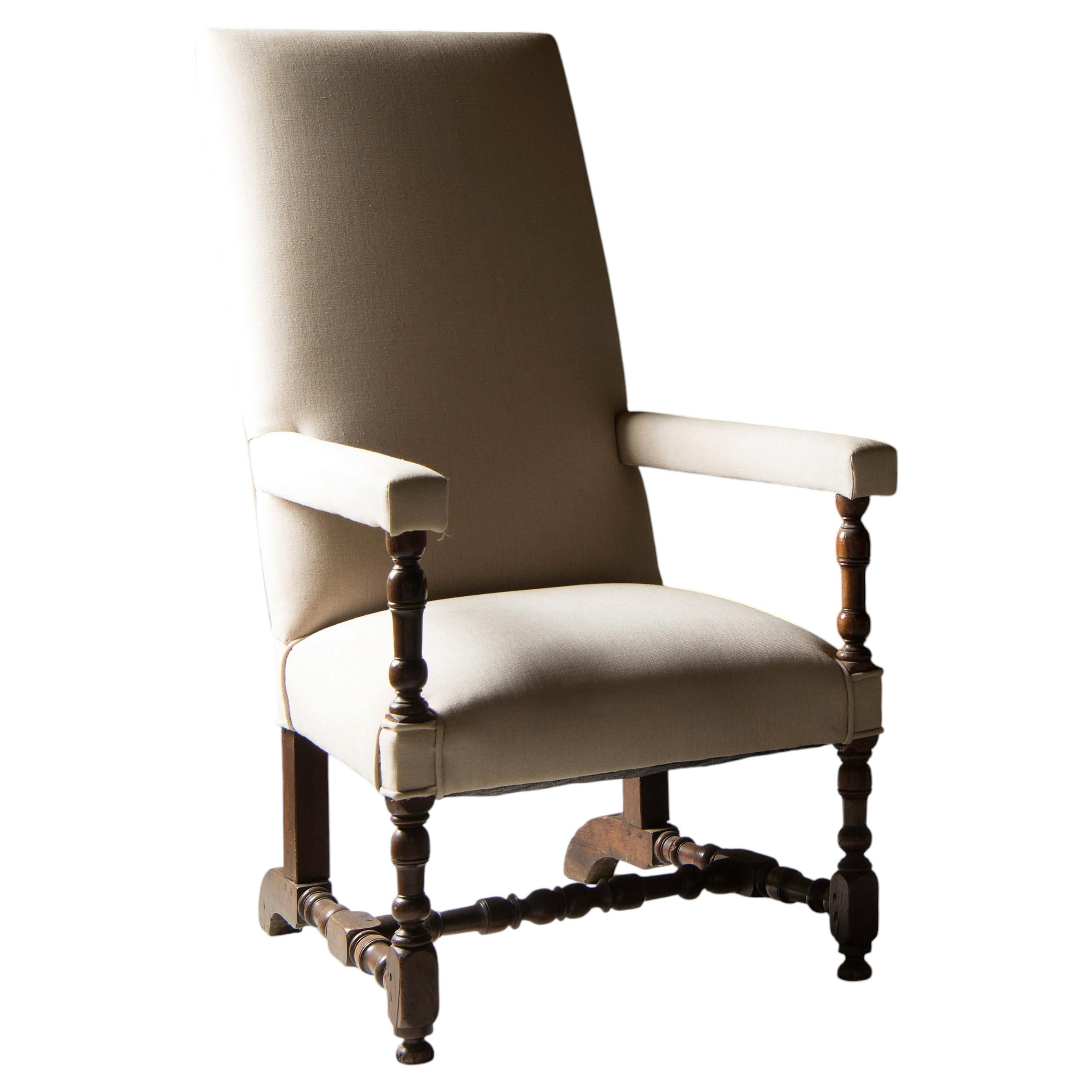 Sillón francés Luis XIII de nogal y lino belga