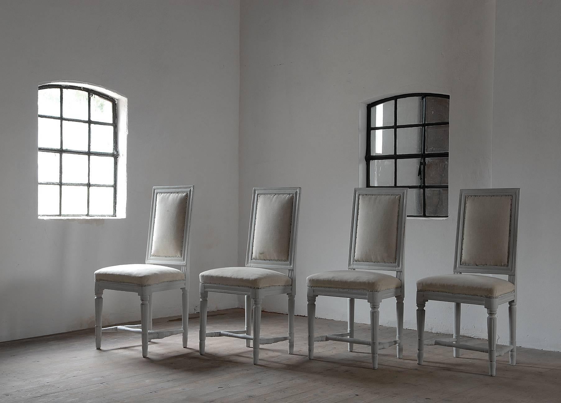 A set of four period gustavian dining chairs, circa 1790-1810. Very elegant, almost Louis XVI form and gustavian stretcher.
