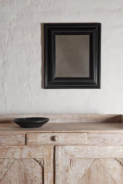Flemish Ebonized Baroque Ripple Molded Combination Profile Mirror