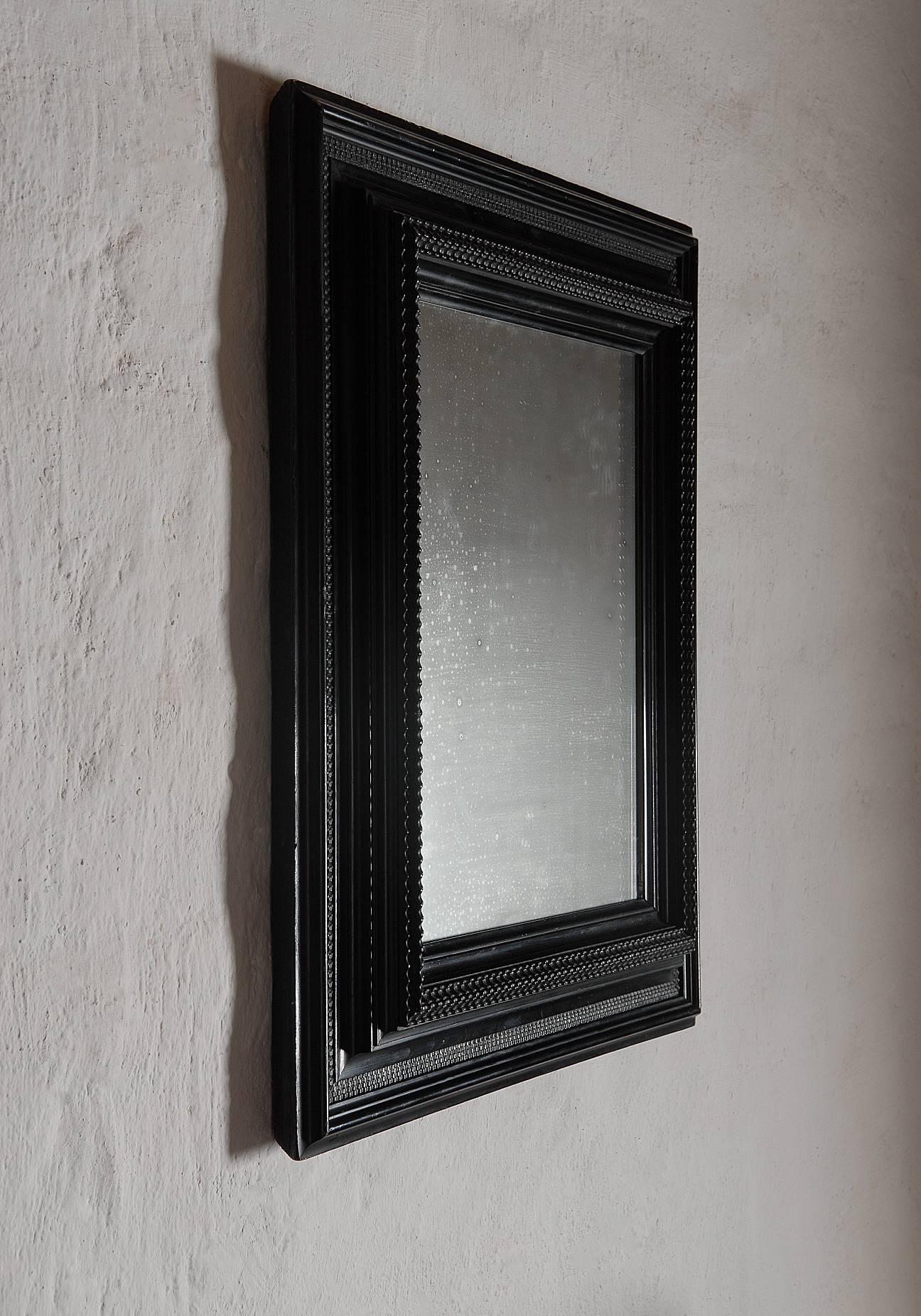 Belgian Flemish Ebonized Baroque Ripple Molded Combination Profile Mirror