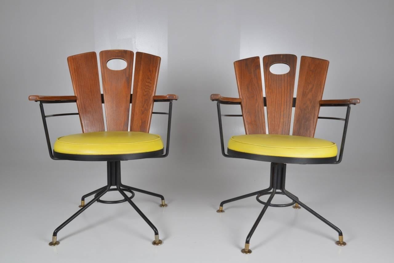 Mid-20th Century Pair of American Oak Swivel Chairs