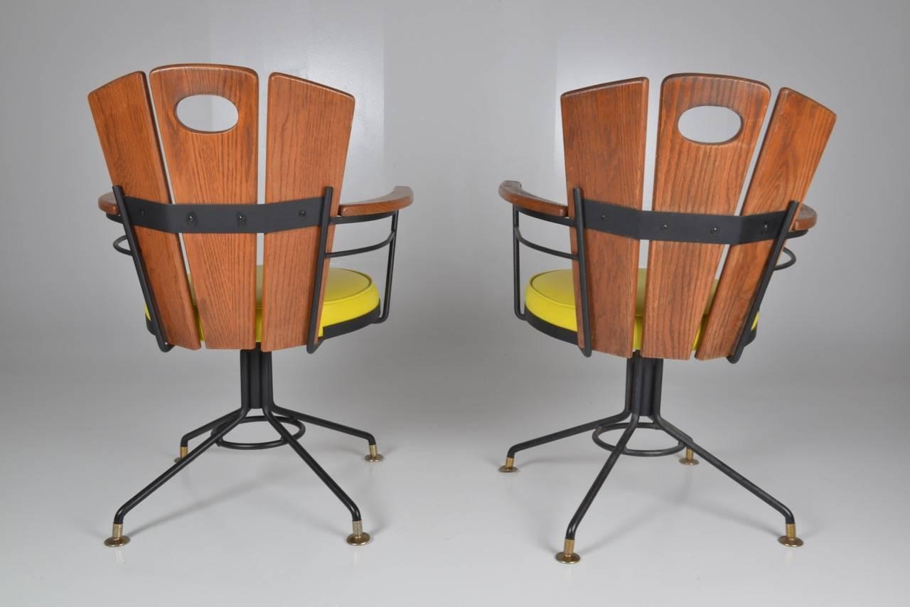 Leather Pair of American Oak Swivel Chairs