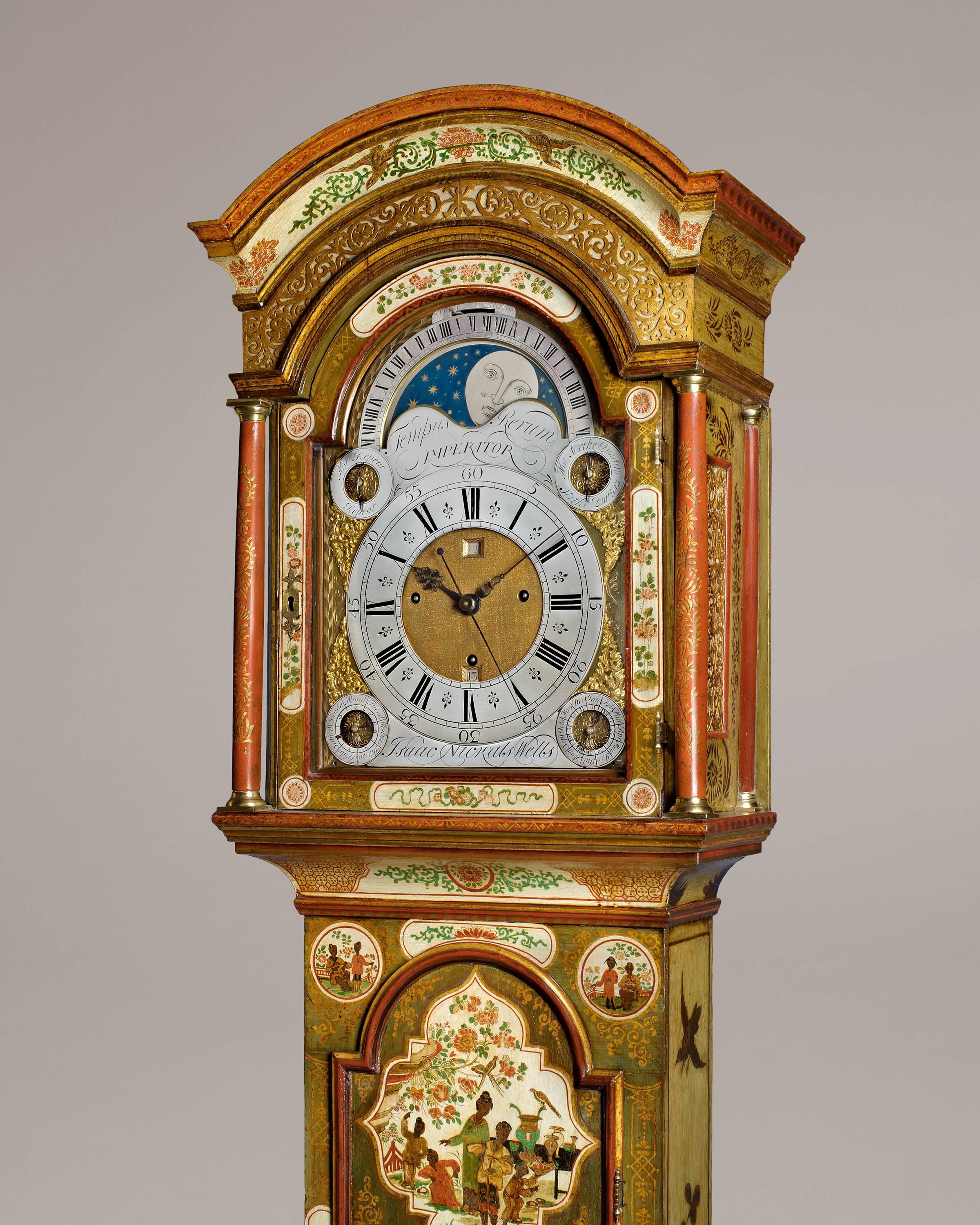 An important George II period cream lacquer longcase clock with three train brass dial quarter chiming movement and moonphase. 

The 12 inch arch dial has an applied silvered Roman and Arabic chapter ring and a subsidiary seconds dial below XII.