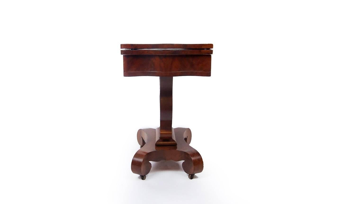 antique mahogany game table