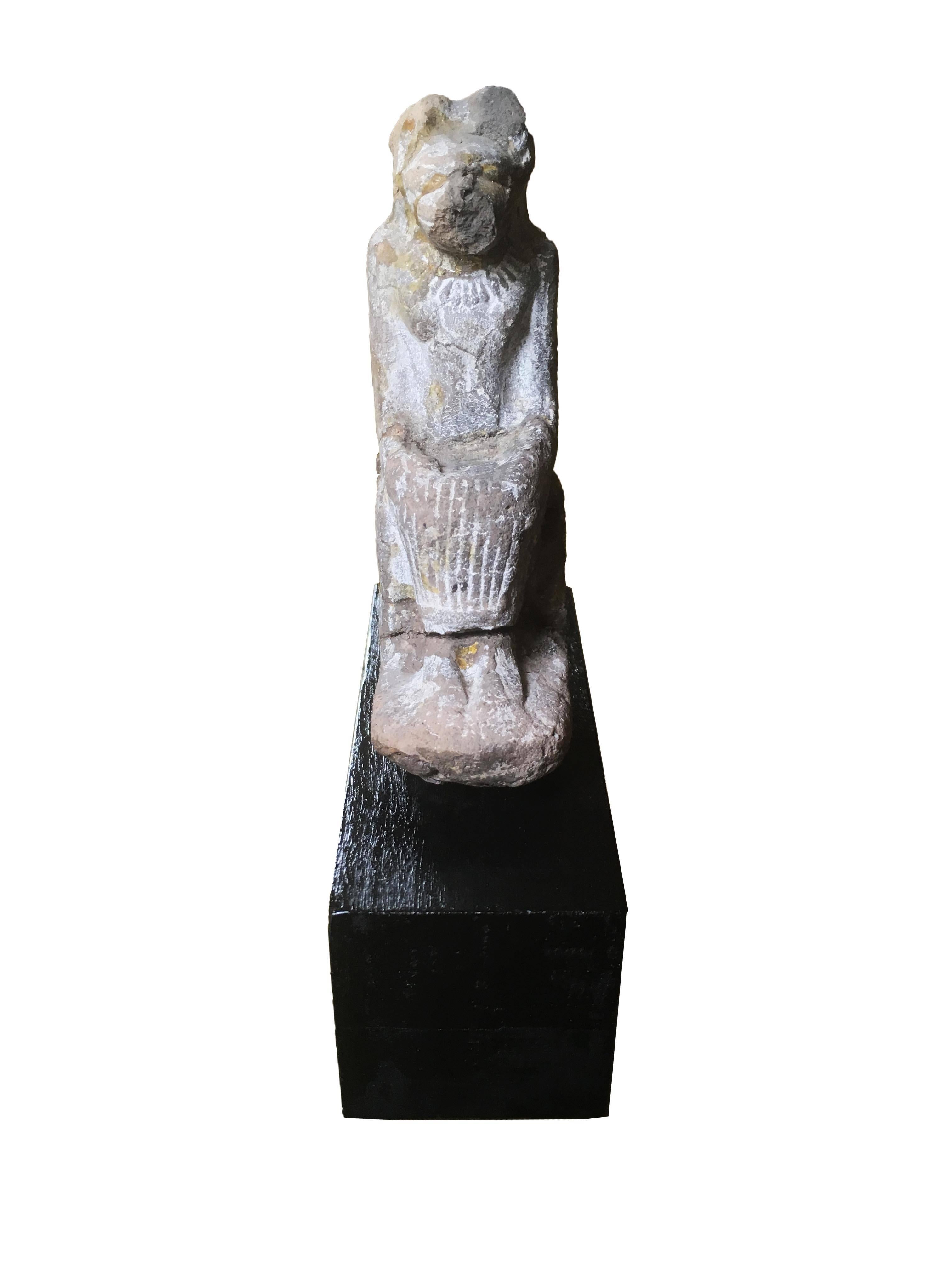 A New Kingdom statue of the female deity Sekhmet, the jealous, quick to anger goddess whose name means "Powerful one." Statues of the goddess were popularly commissioned by Kings and commoners as talismans against bad fortune. The clay