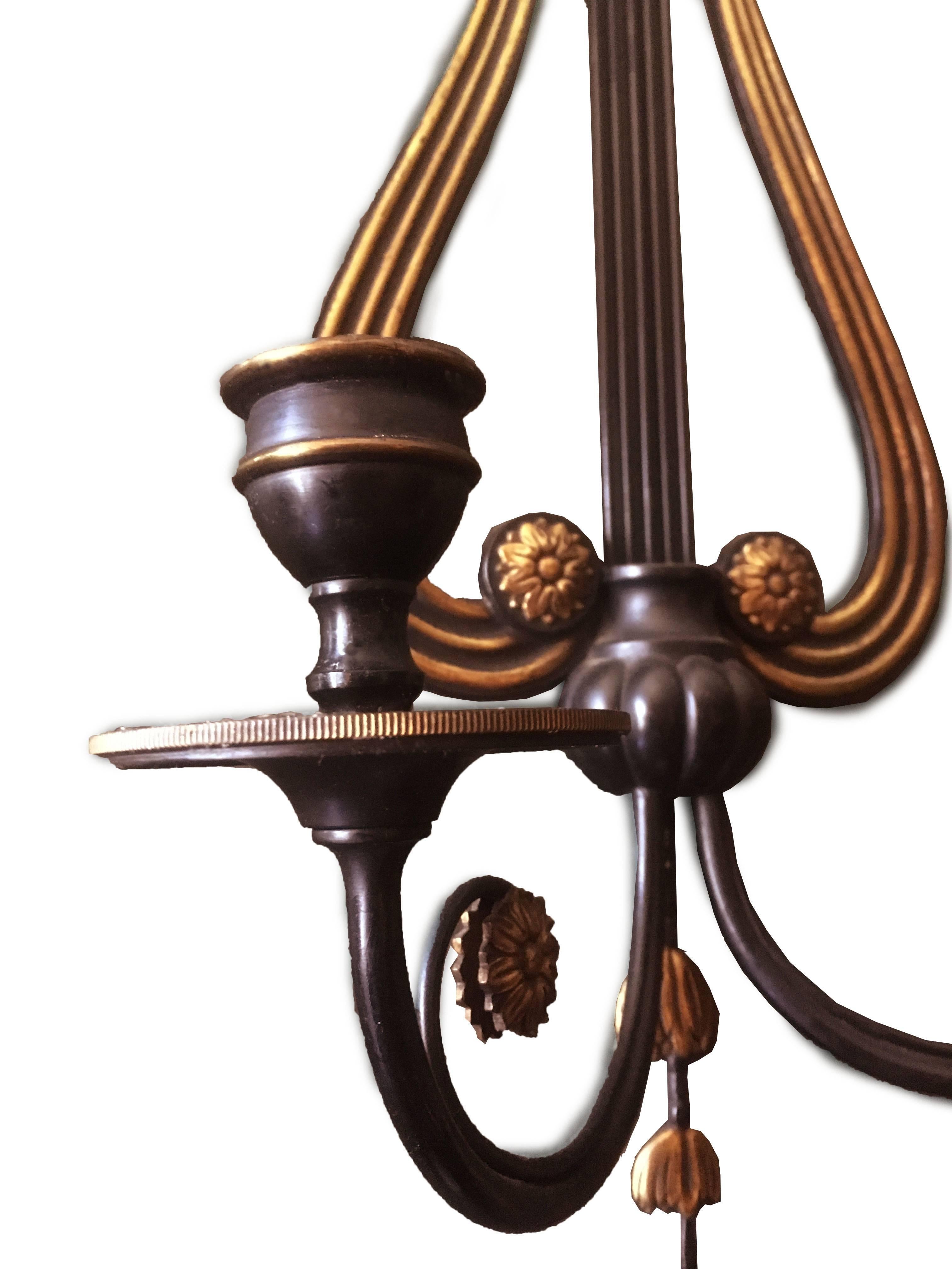 French Pair of Early 20th Century Gilt Brass and Lacquered Regency Style Lyre Sconces