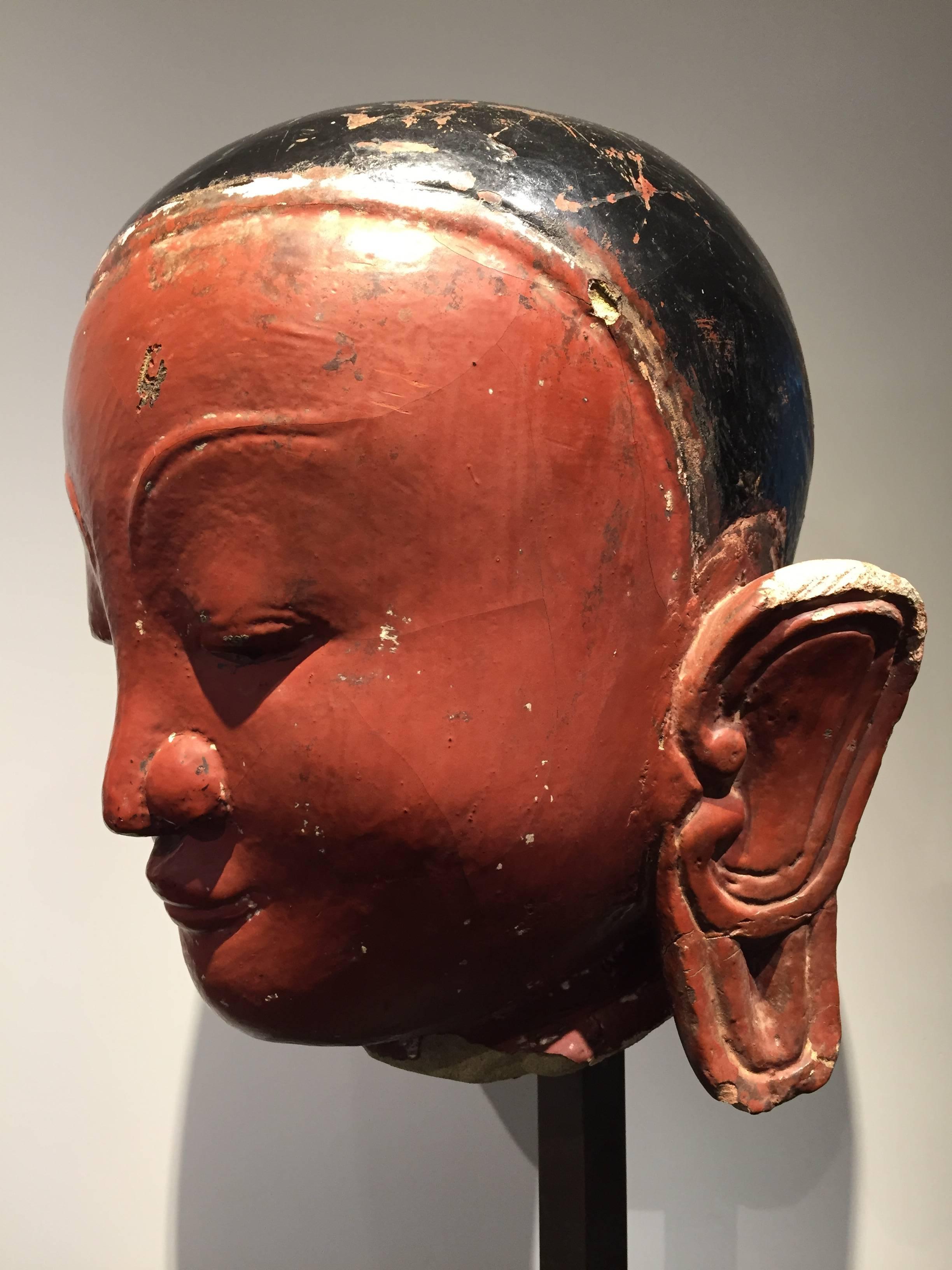 Burmese 14th Century Sandstone wth Red and Black Lacquer Lohan Head, Pagan Period, Burma For Sale