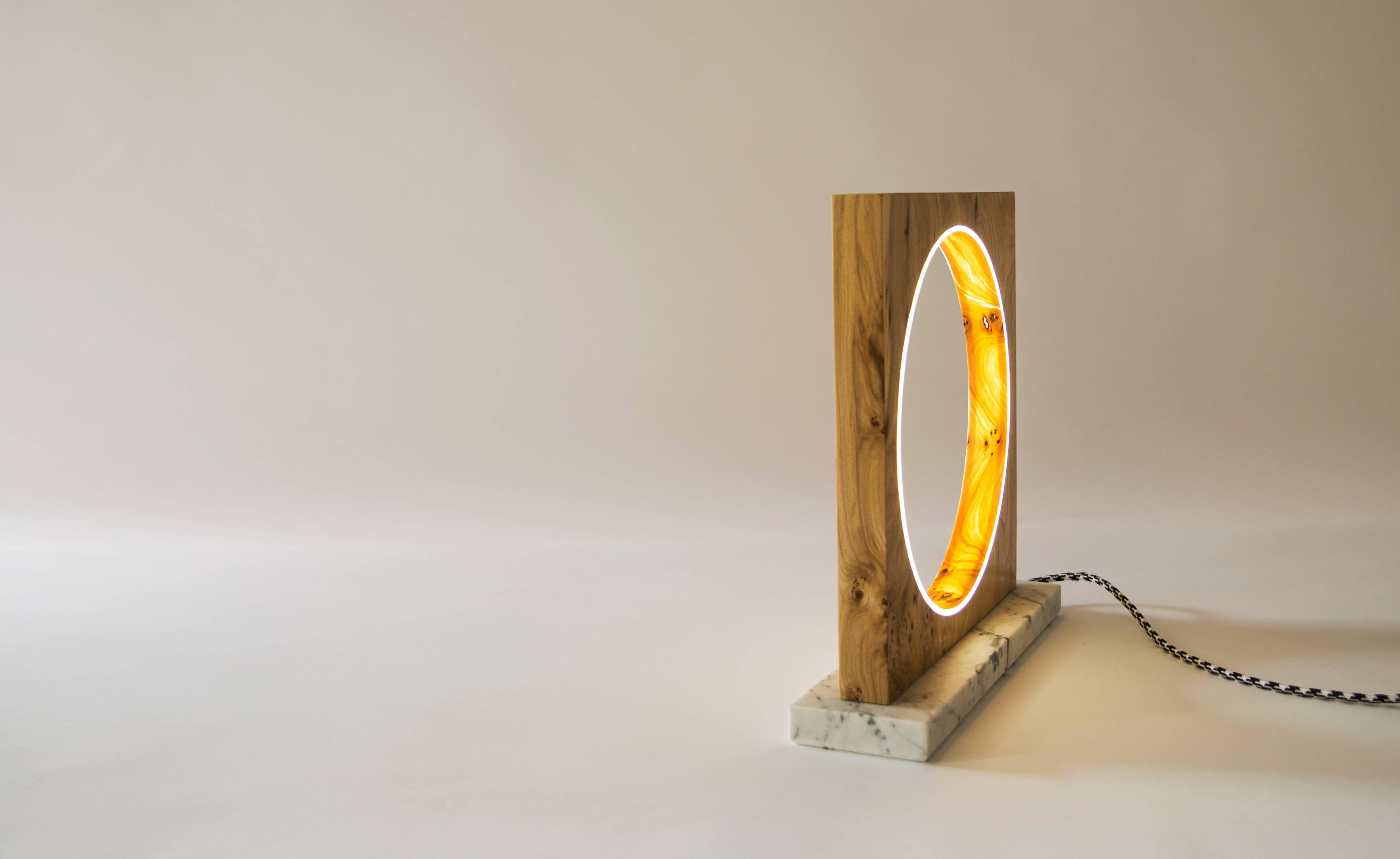 The light sculpture is inspired by the solar eclipse when the shadow of the moon crosses the Earth’s surface. The form of the object is an expression of opposites: light and shadow; solid mass and void; straight lines and curves.

  