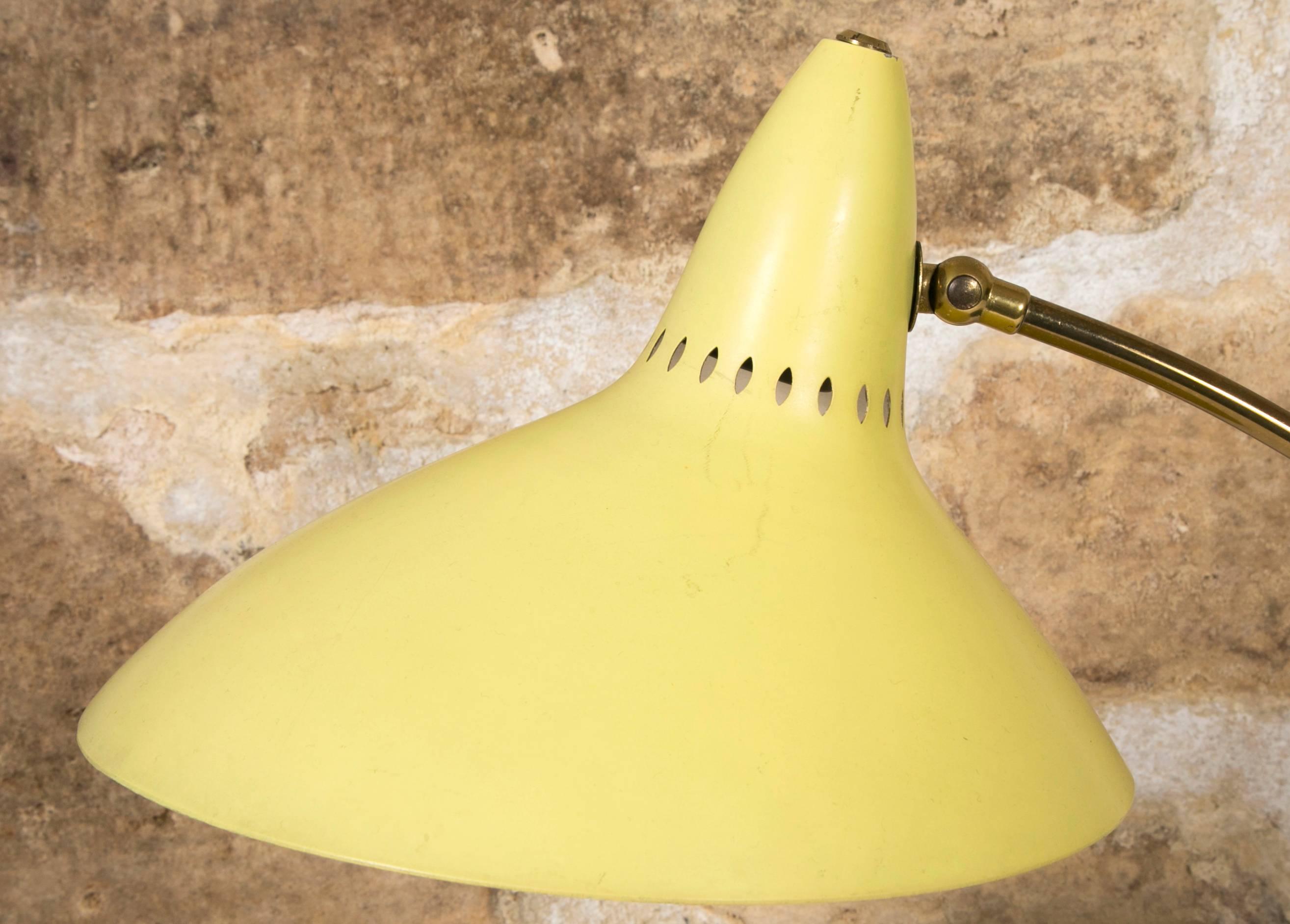Elegant and simple Italian Mid-Century table lamp with nice color of lemon shade.