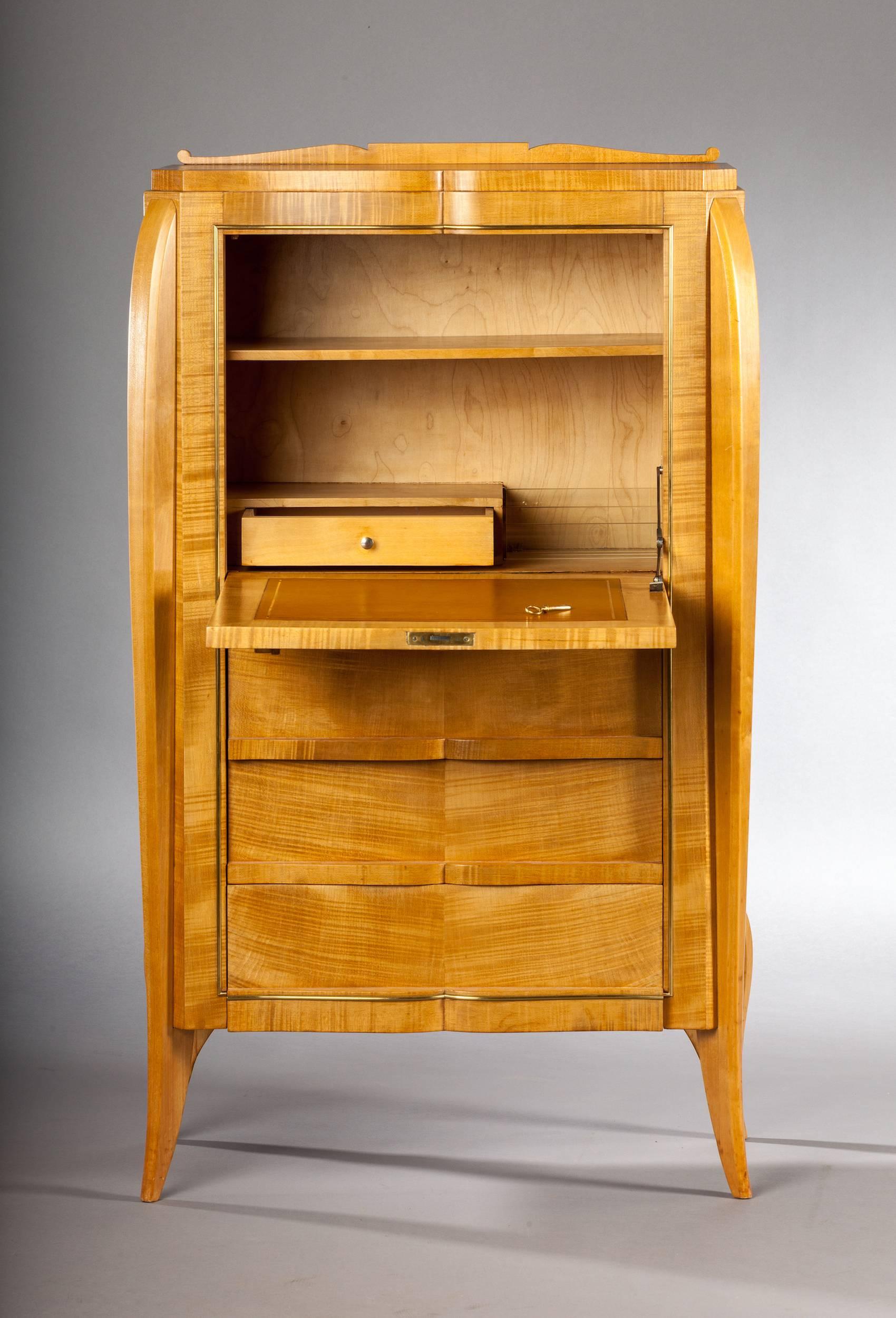 Beautiful French sycamore veneer secretary framed with gilded brass details, the fall front decorated with the original cafe au lait coloured leather, inside is the drawer and elegant glass paper holder. Attributed to René Prou (1889-1947).