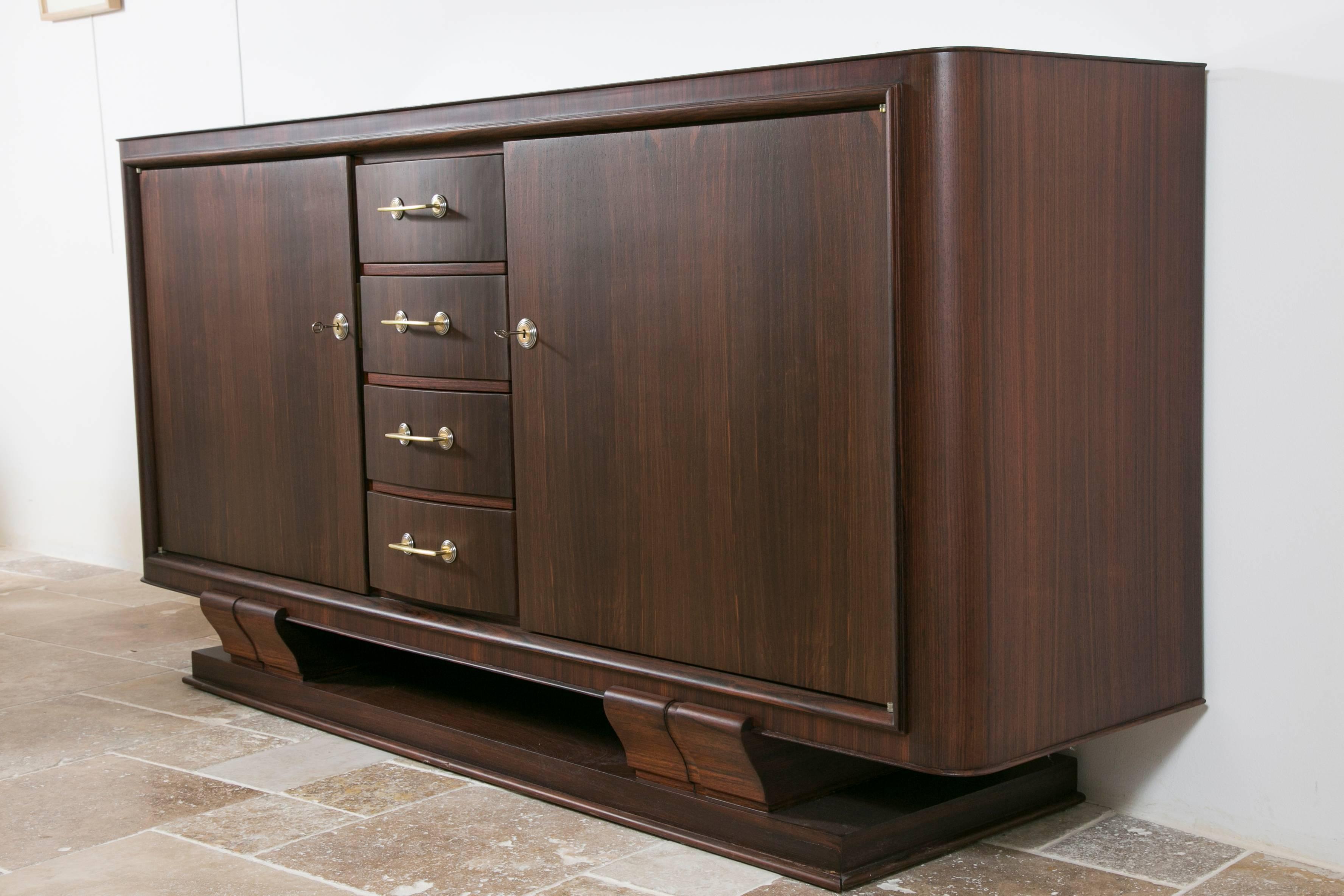 Elegant palisander cabinet by great cabinetmaker of 20th century Maxime Old (1910-1991).
