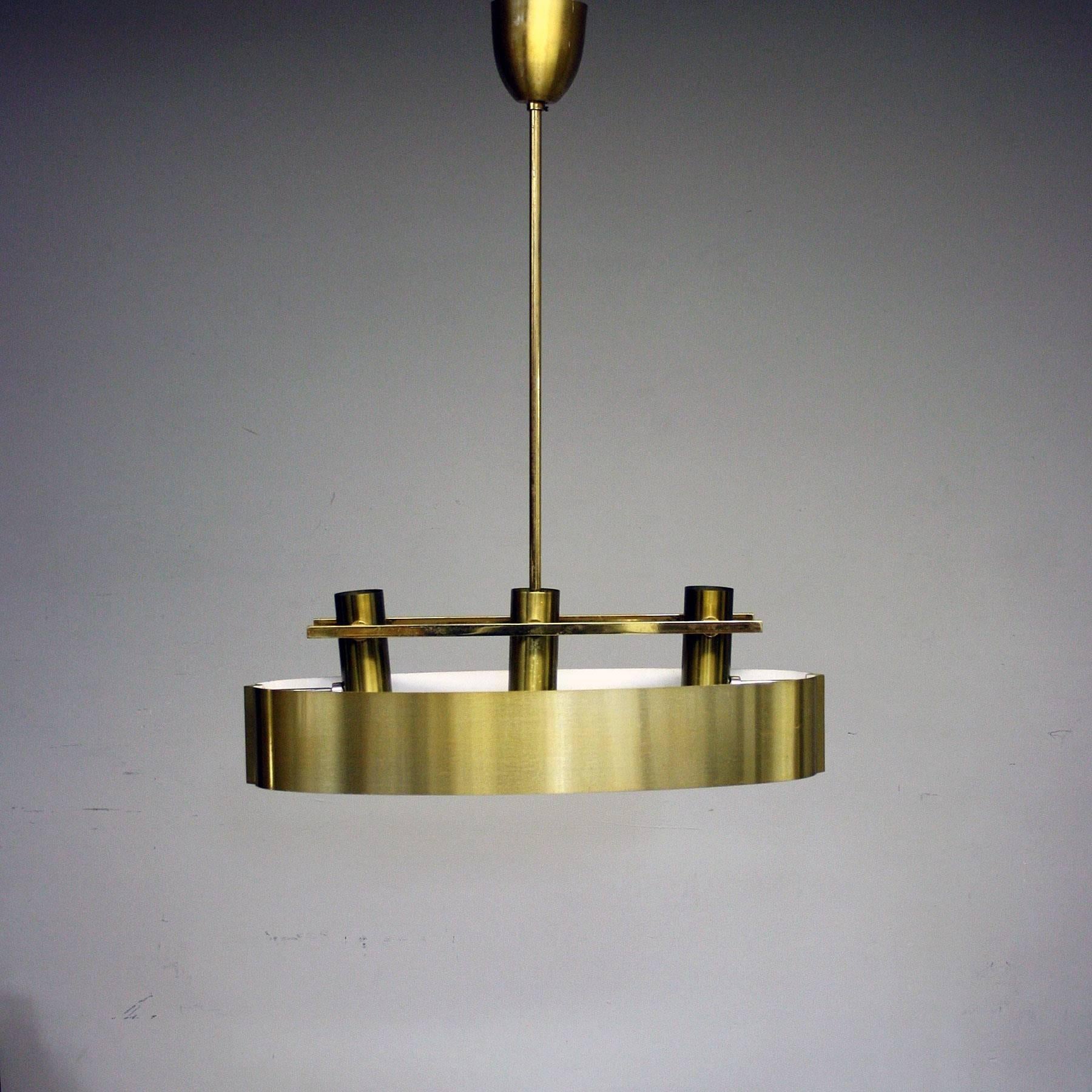 A fantastic Mid-Century brushed brass French ceiling light, the shade can swivel from right to left revealing the light fittings. 

Would look fantastic over a kitchen counter but would look great anywhere.

Little bit of ware consistent with