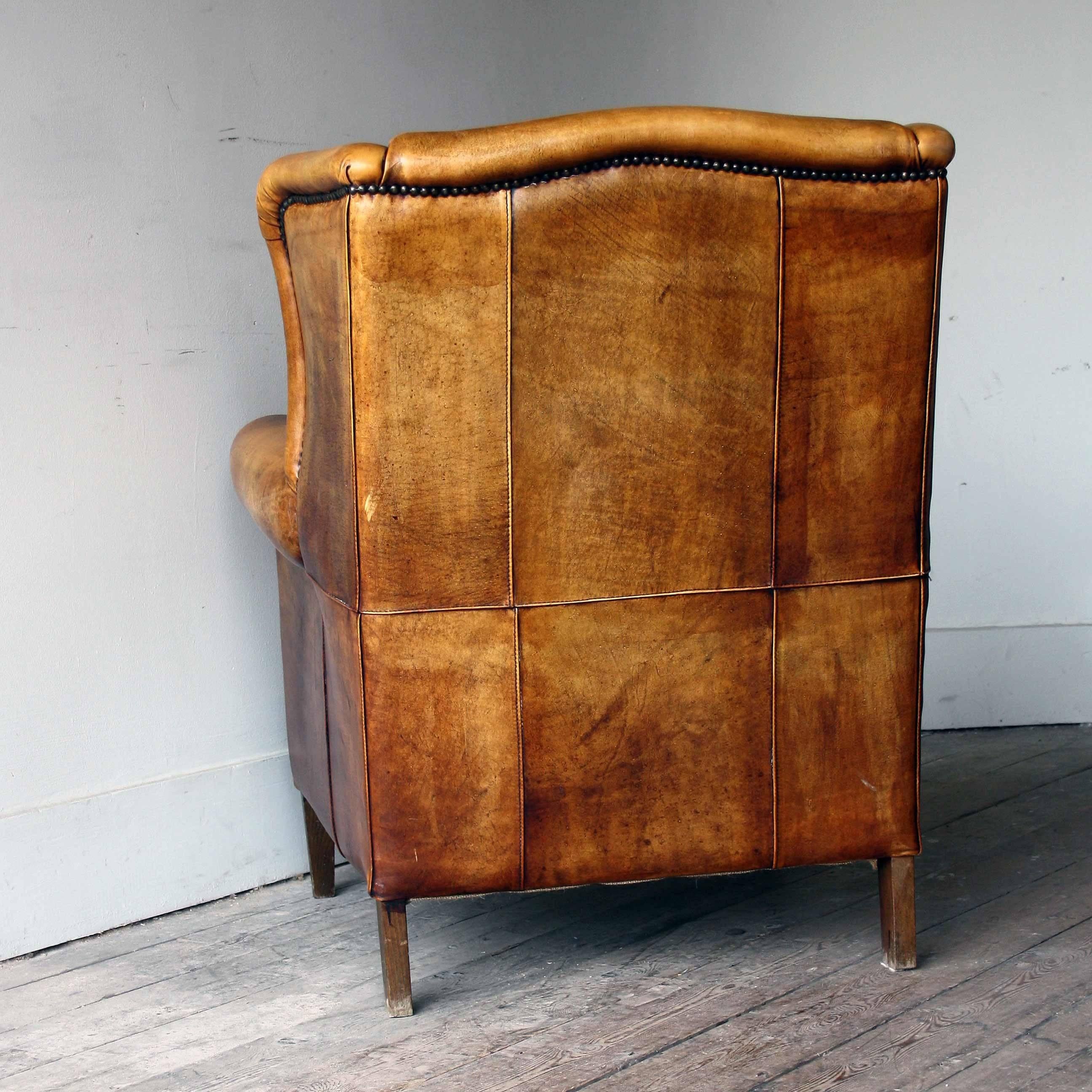 tan leather wingback chair