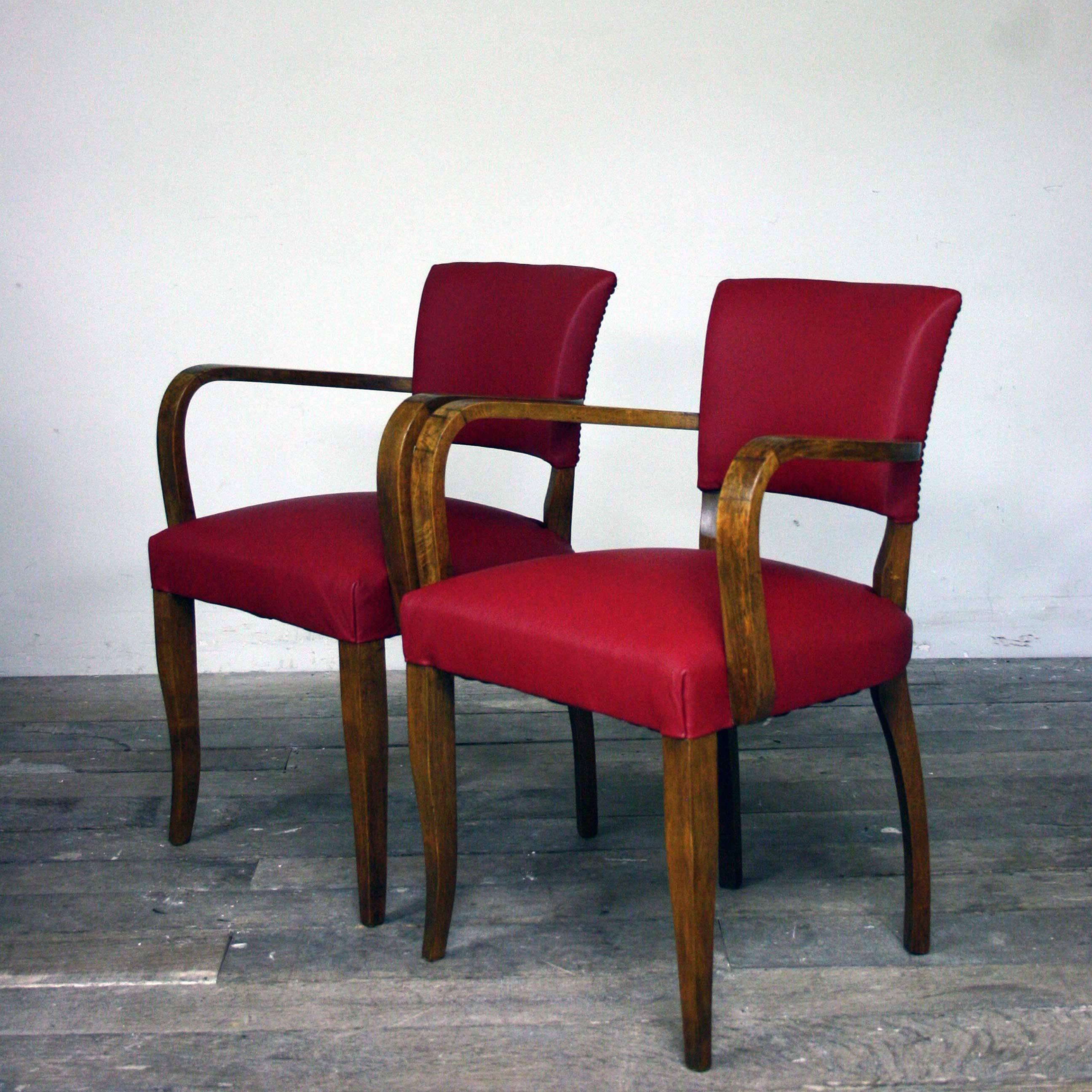 1930s reupholstered red leather bridge chairs.

Unfortunately I could not save the original leather, but this red leather really makes an impact and will age nicely with time.

Additional dimensions: Armrest height 67cm
 Seat height 47cm.