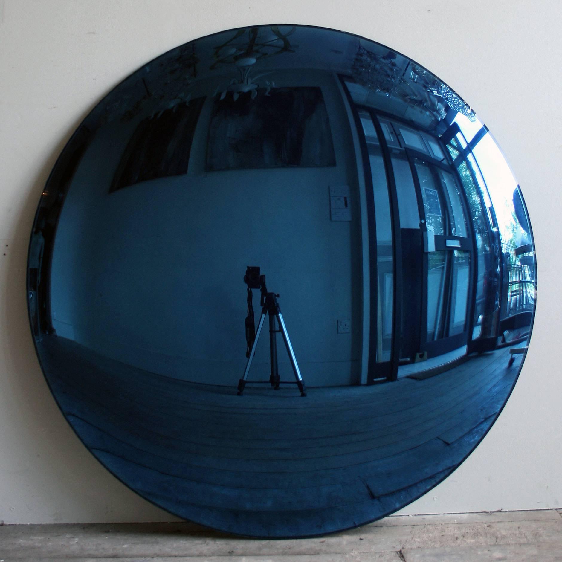 A large Blue Convex mirror 100cm in diameter, each mirror is unframed but come with x3 bespoke clips for wall installation. A real statement piece!

All color mirrors have a two-three week lead time as all made to order.

As each piece is