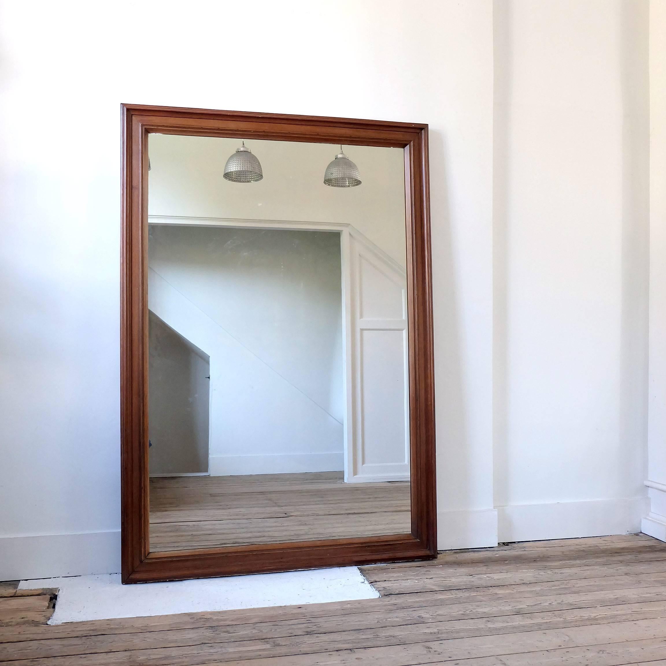 A real statement mirror, Huge Edwardian walnut frame, nice clean lines and original mirror plate.

If you`re looking for something not to fussy, then this is the mirror for you.