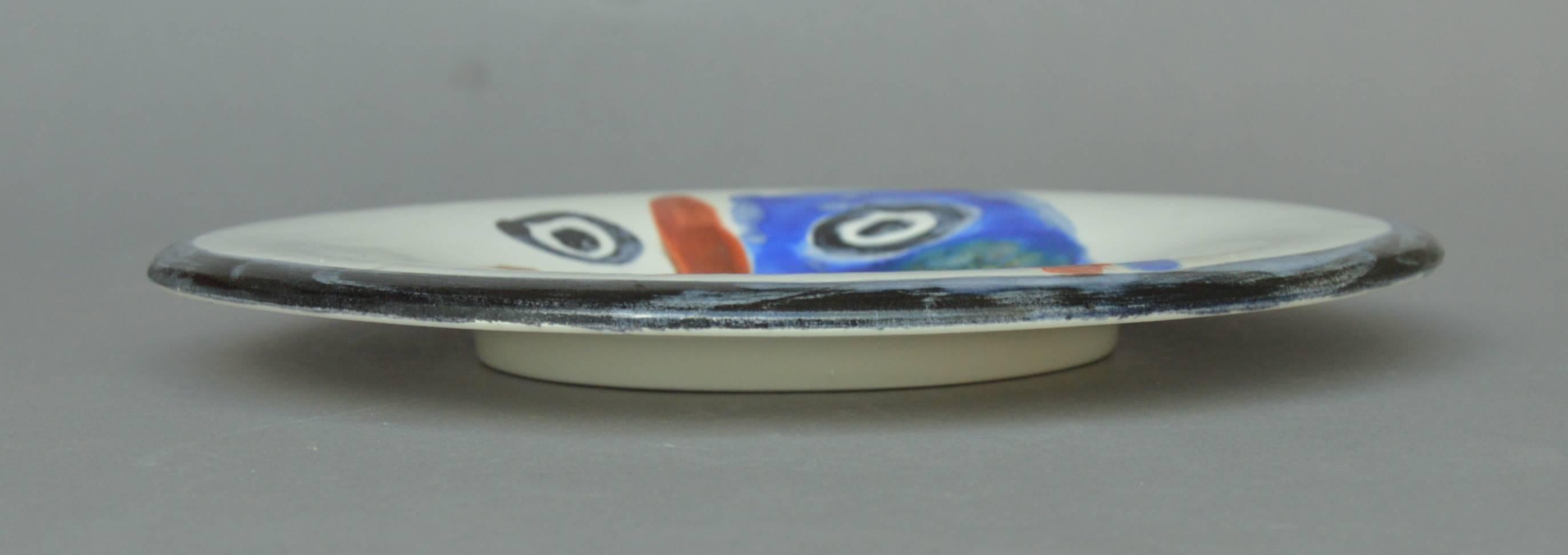 Pablo Picasso madoura ceramic plate face no.193, circa 1963. Pablo Picasso round partially glazed ceramic plate - Face No. 193 (