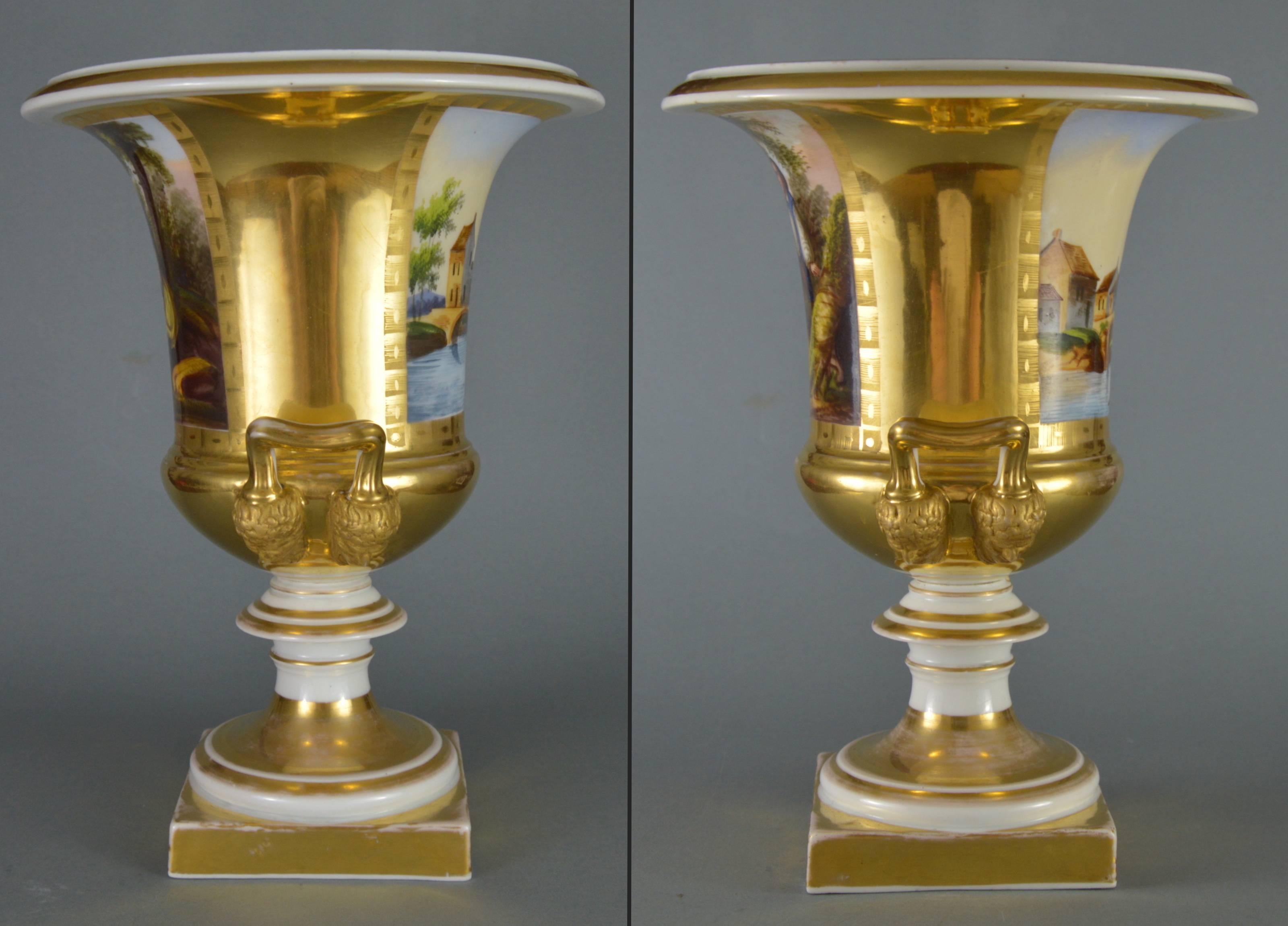 Pair of French Empire porcelain medici vases. The main face of each vase is decorated by gorgeous romantic scenes, the other side with landscapes. Created in a period between 1820-1840.
Measures: Height: 31.5 cm, Ø – 23.5 cm.

Condition report: