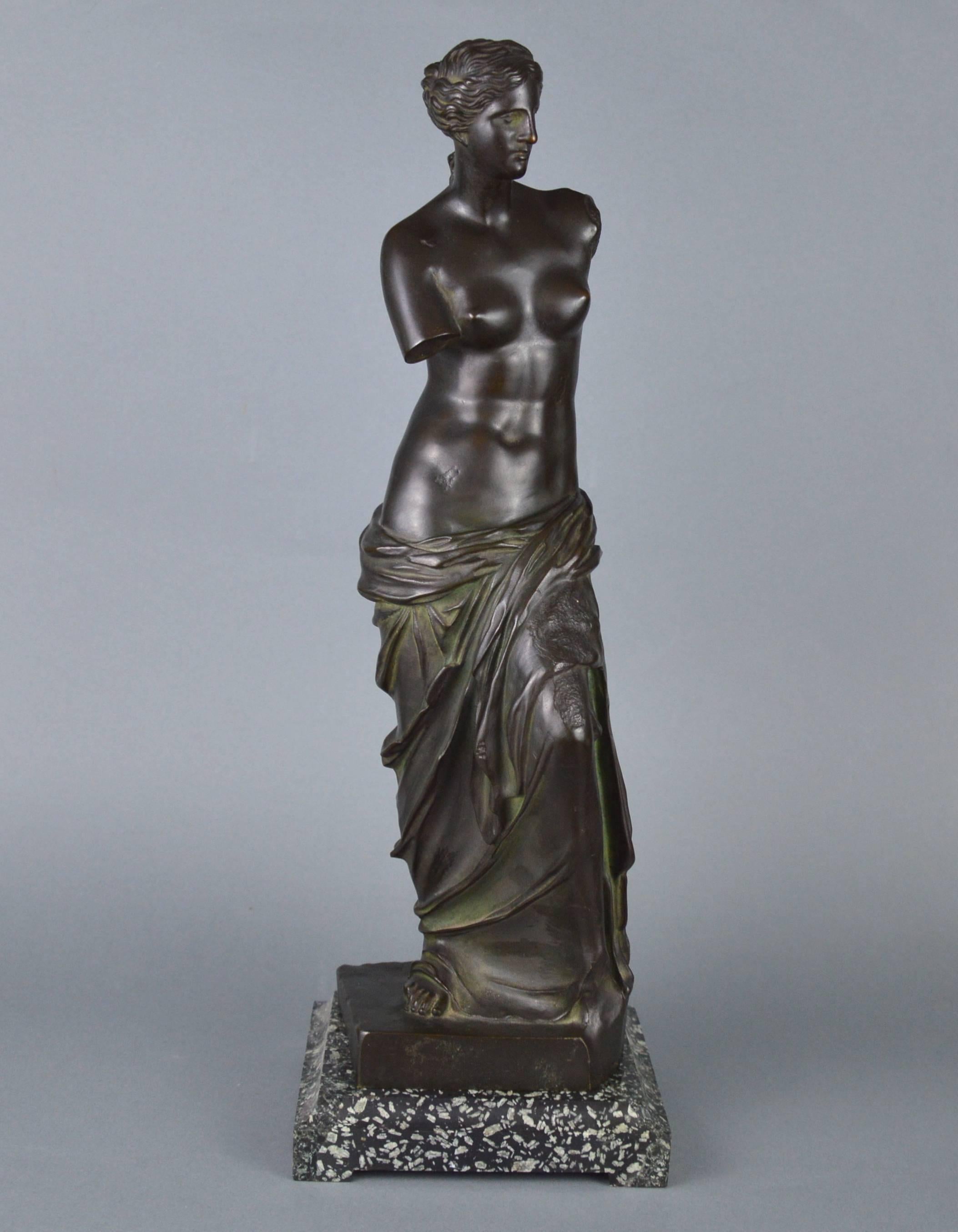 Bronze sculpture of Venus de Milo. Venus of Milo. Black patina. On a green flamed marble stand, early 20th century.

Measures: Height: sculpture 18